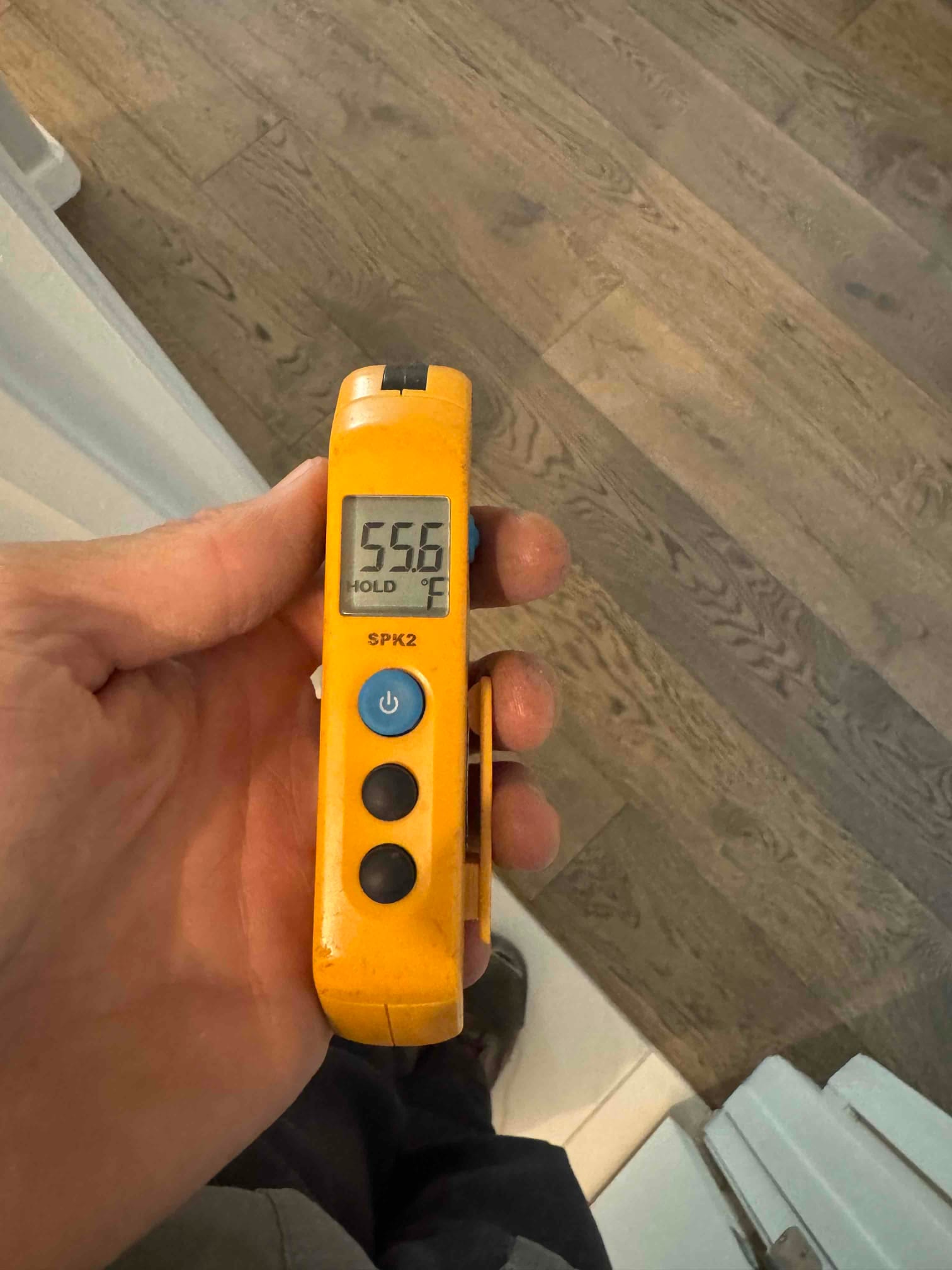 Diagnostic instrument display shows 55.6 °F.