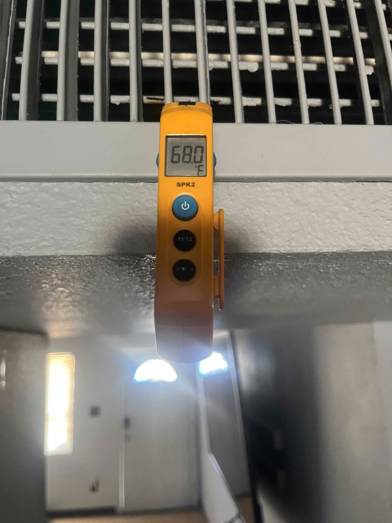 Diagnostic instrument display shows 68 °F.
