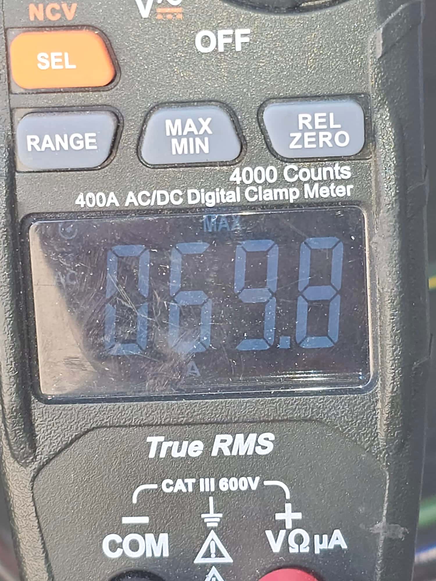 Diagnostic instrument display shows 69.8 A.