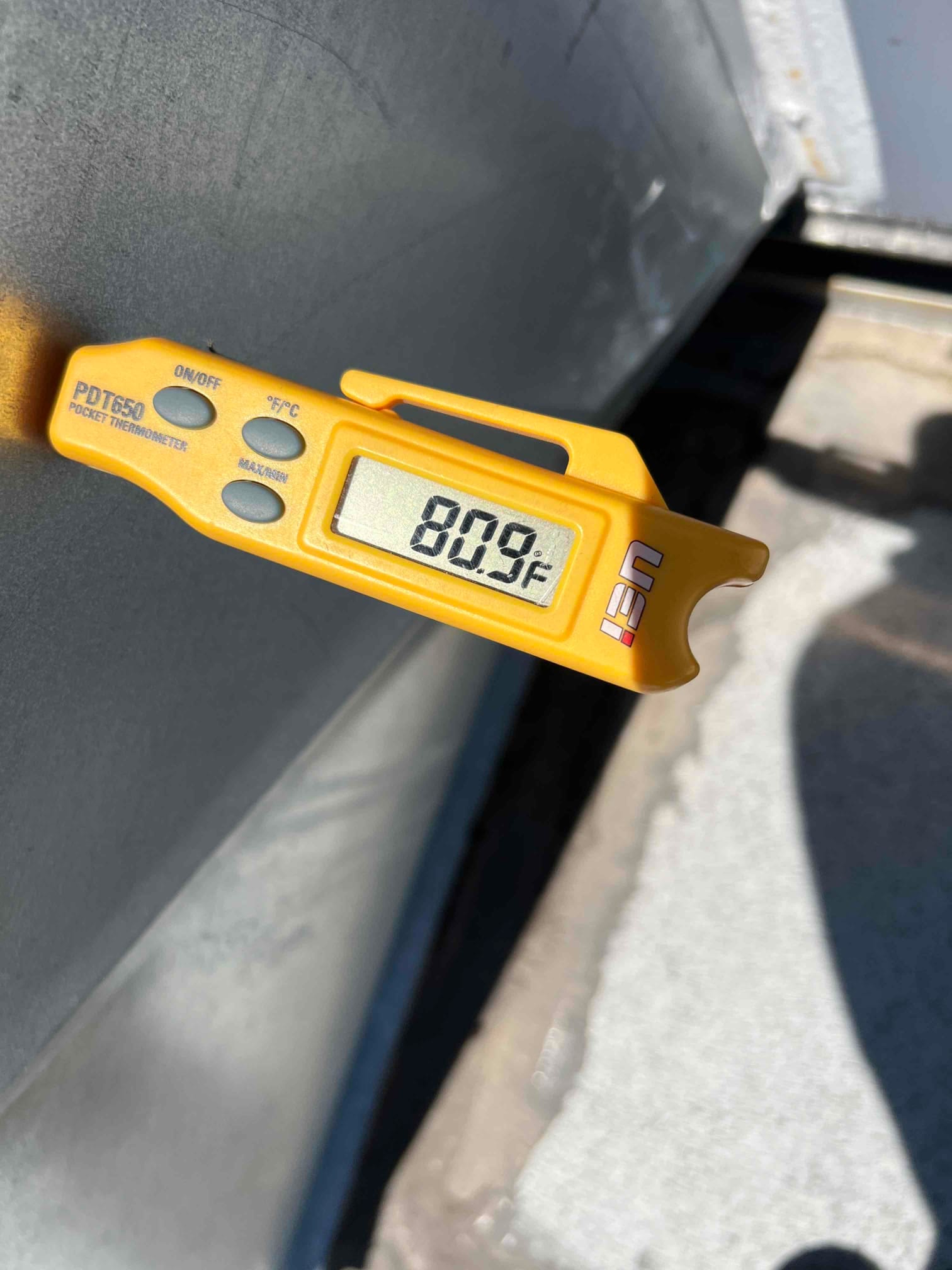 Diagnostic instrument display shows 80.9 °F.