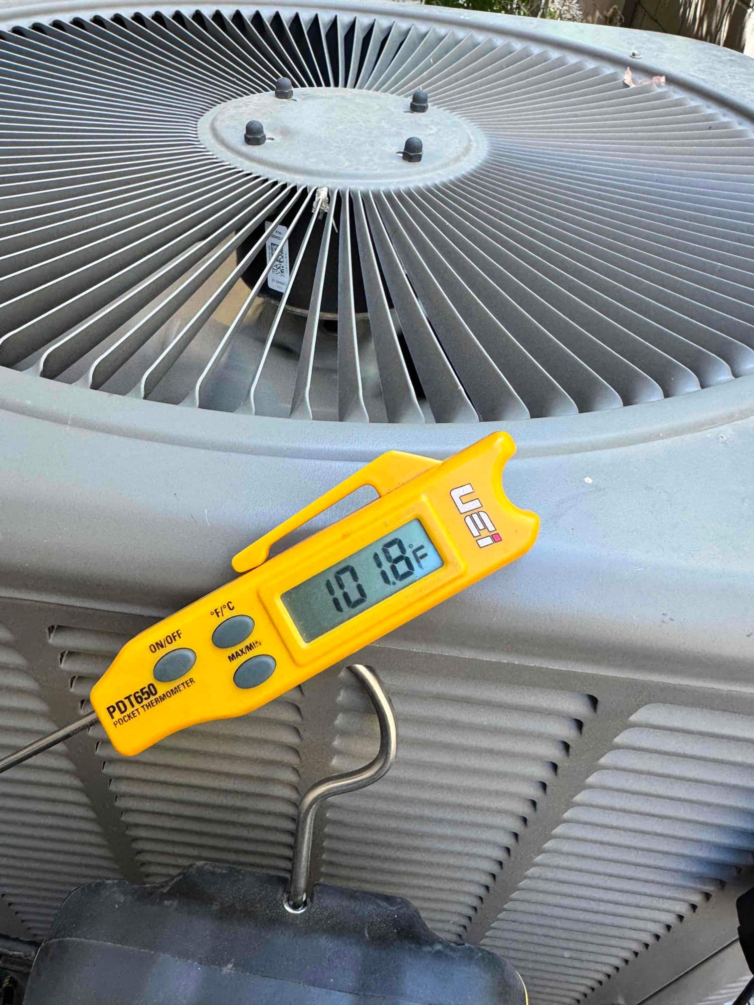 HVAC diagnostic instrument photographed during the service visit.