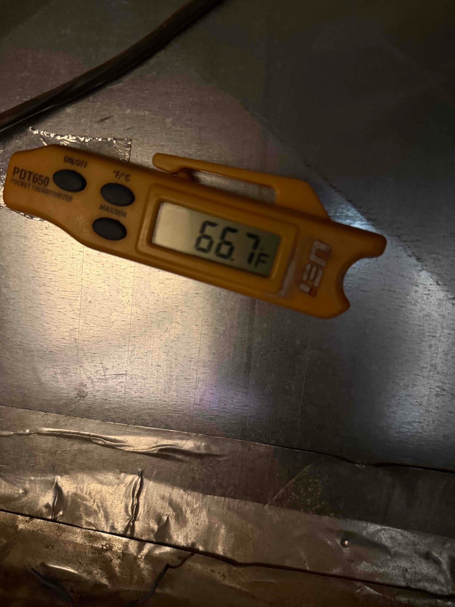 HVAC diagnostic instrument photographed during the service visit.
