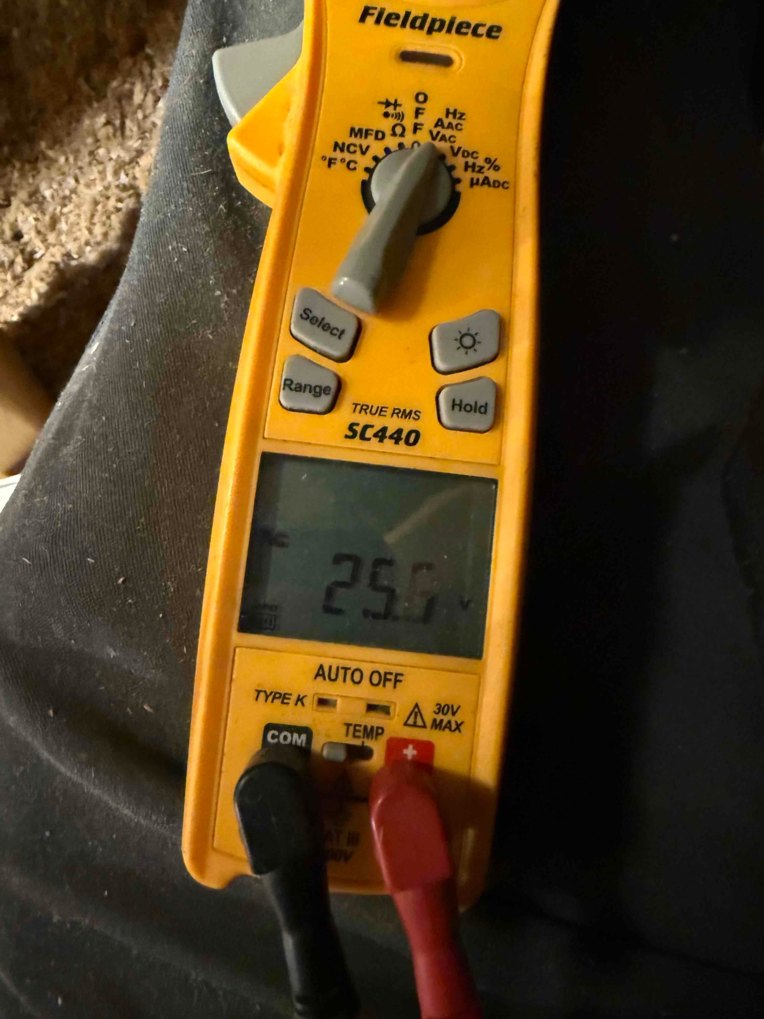 HVAC diagnostic instrument photographed during the service visit.