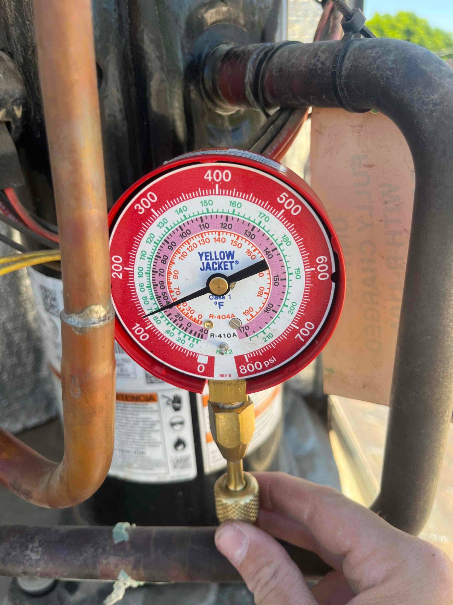 HVAC diagnostic instrument photographed during the service visit.