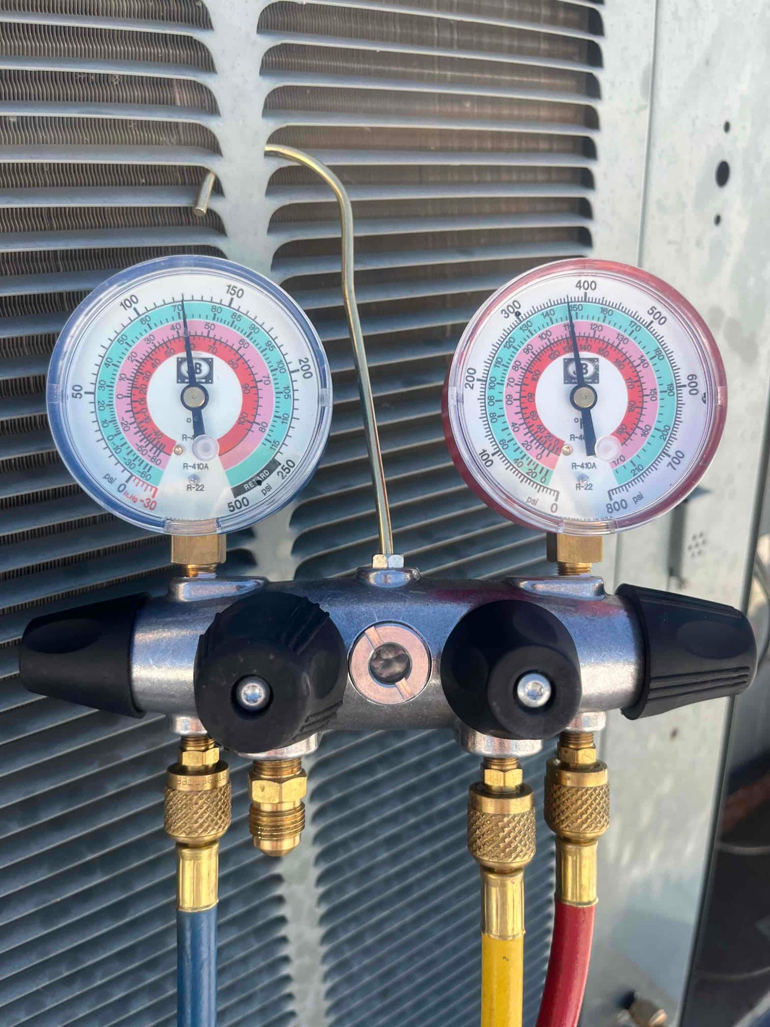 HVAC diagnostic instrument photographed during the service visit.
