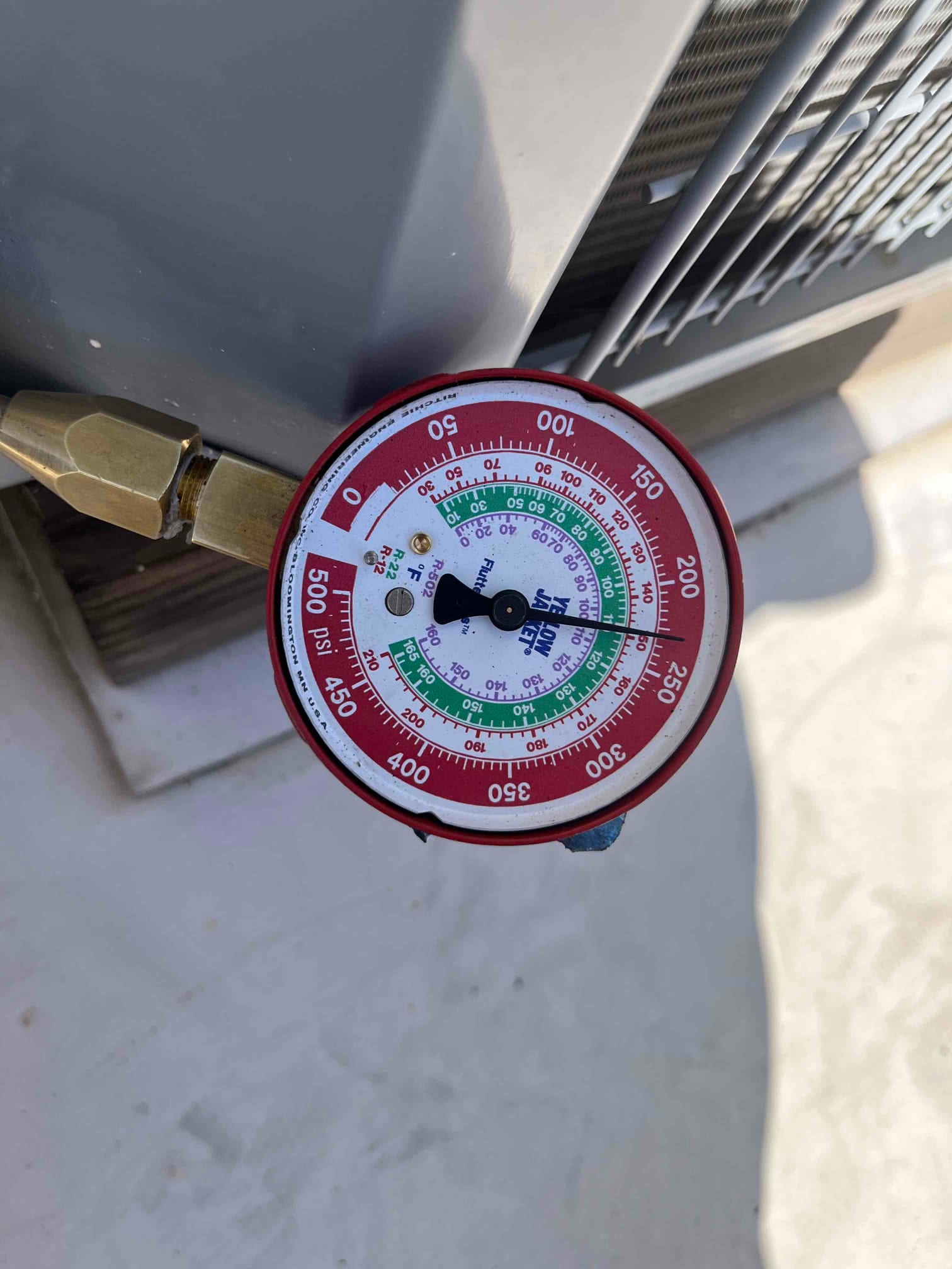 HVAC diagnostic instrument photographed during the service visit.