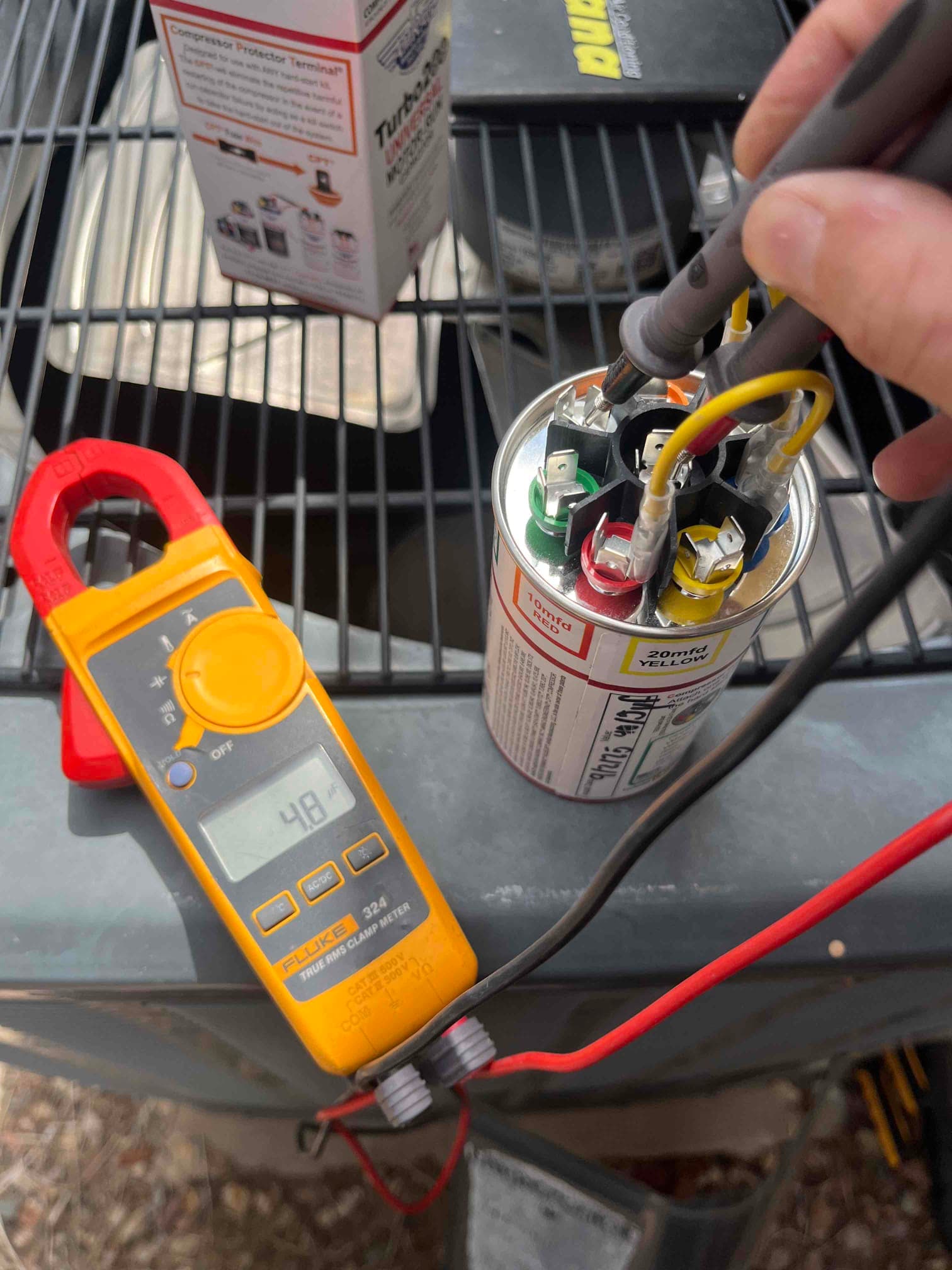 HVAC diagnostic instrument photographed during the service visit.
