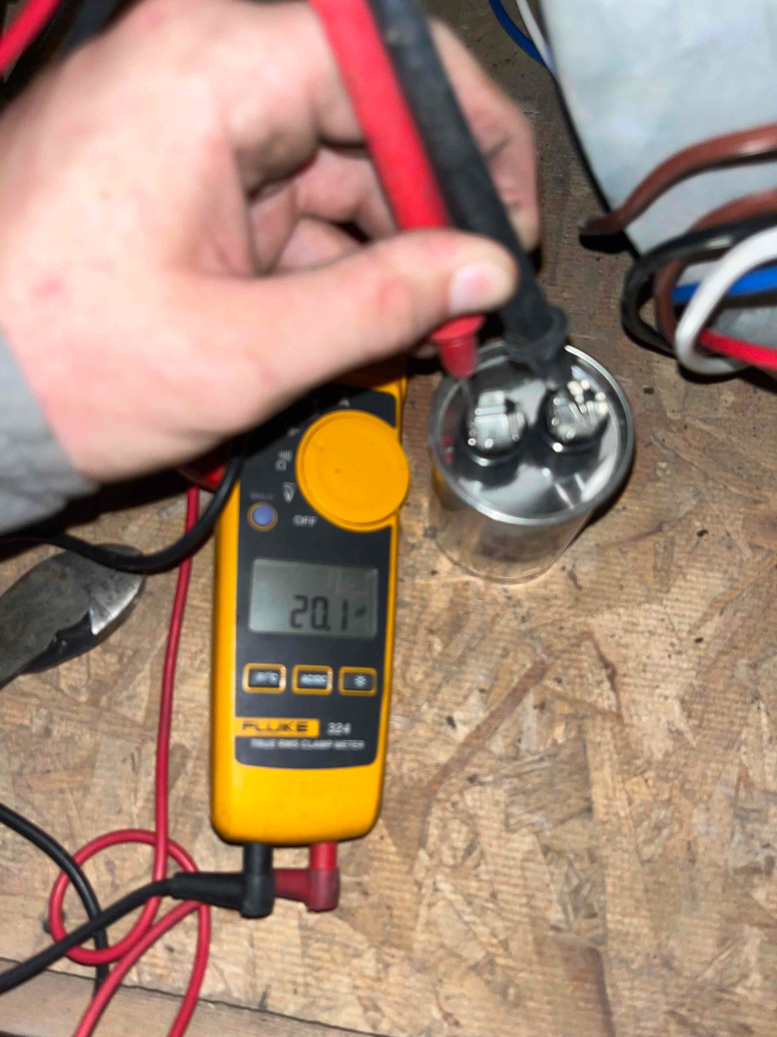 HVAC diagnostic instrument photographed during the service visit.