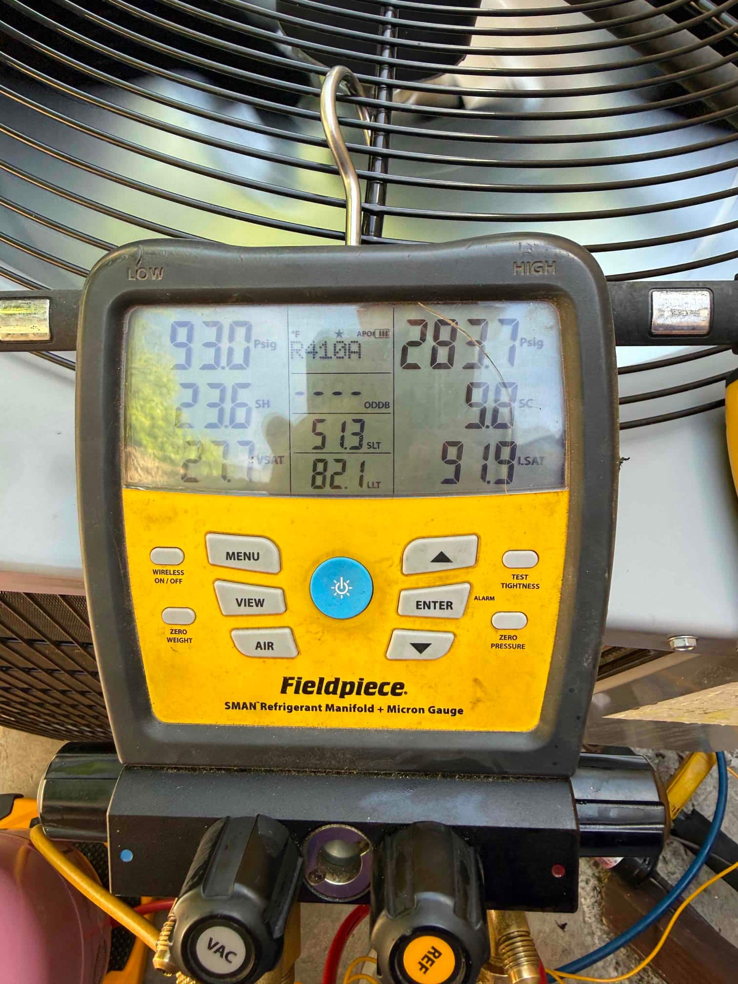 HVAC diagnostic instrument photographed during the service visit.