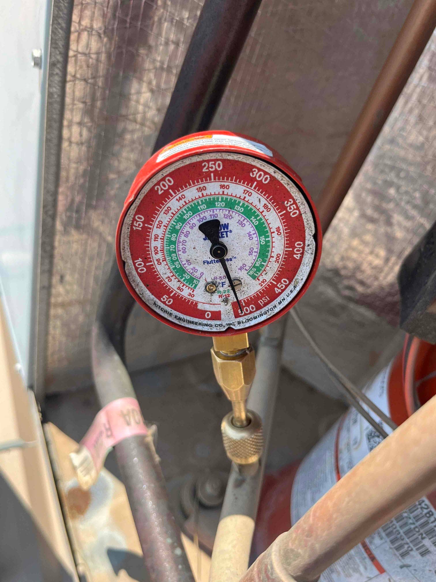 HVAC diagnostic instrument photographed during the service visit.