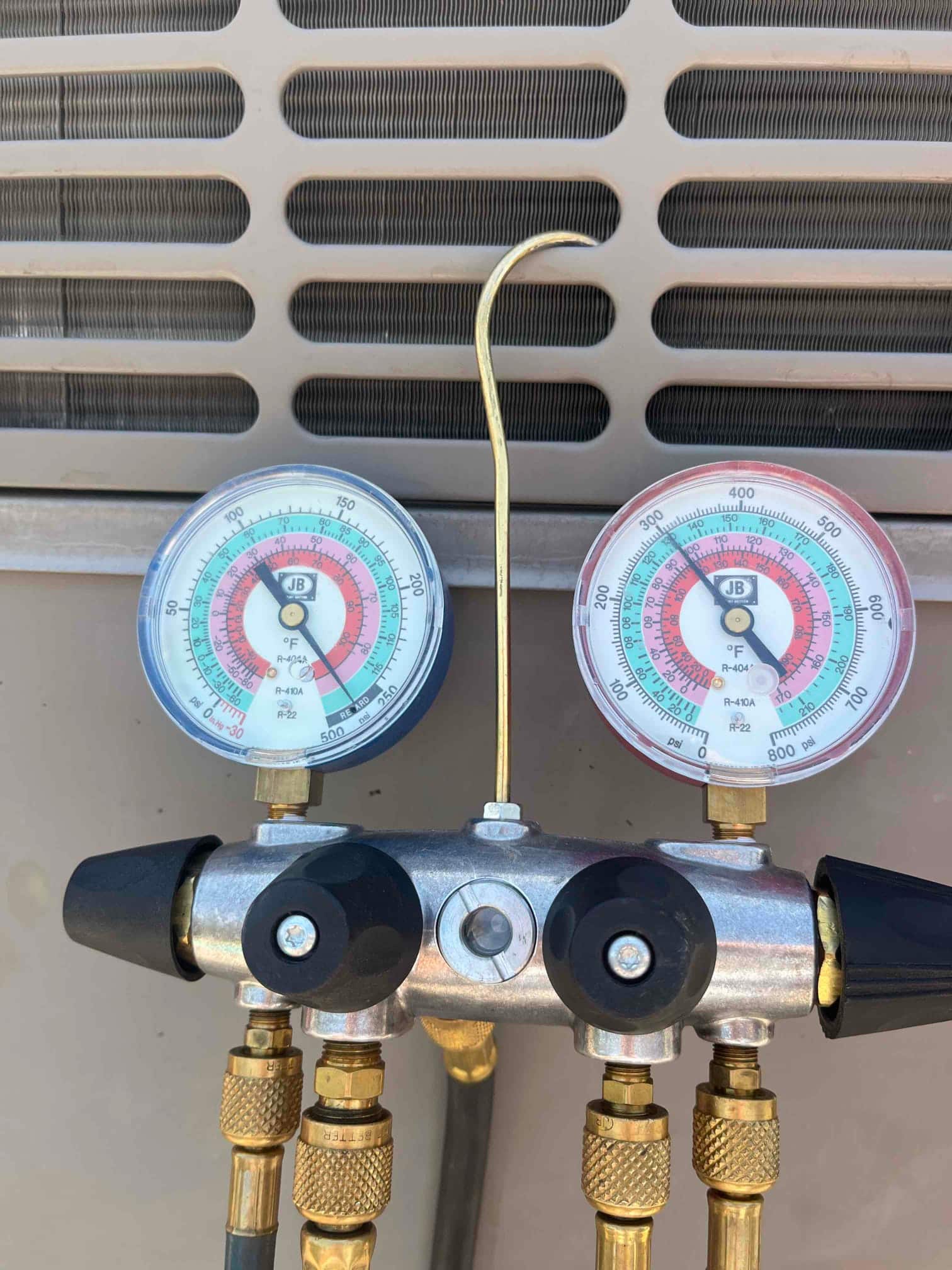 HVAC diagnostic instrument photographed during the service visit.