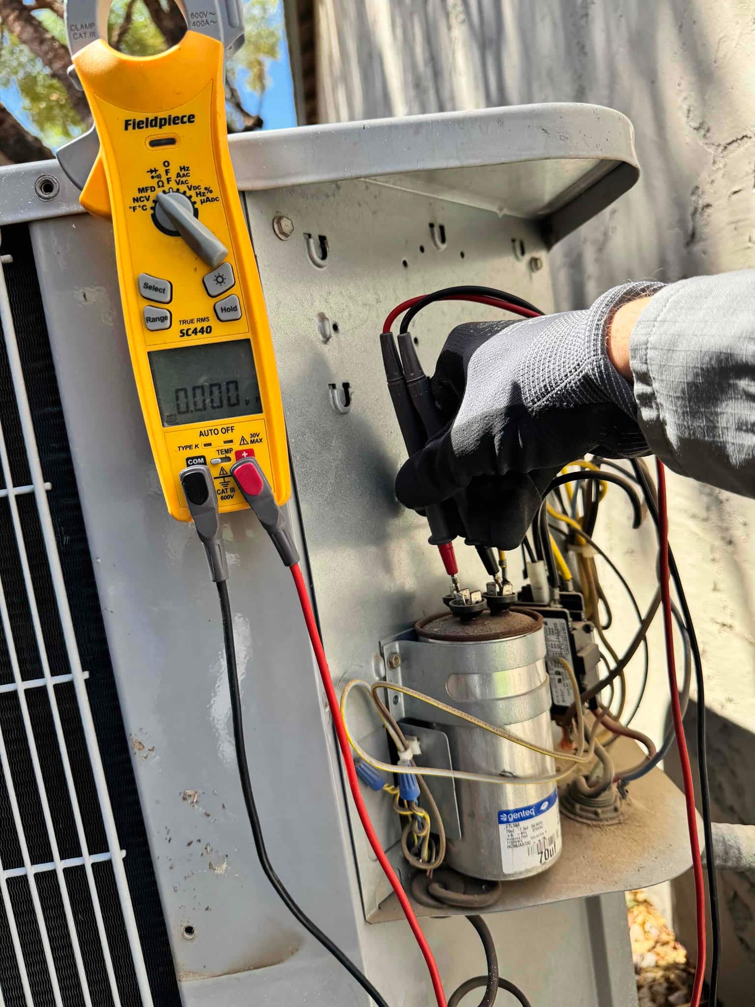 HVAC diagnostic instrument photographed during the service visit.