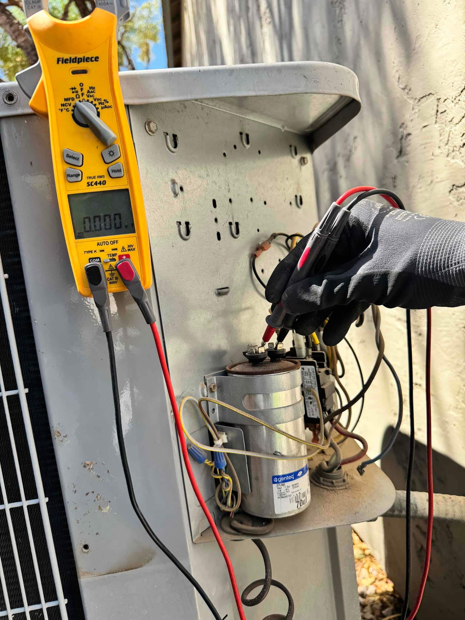HVAC diagnostic instrument photographed during the service visit.