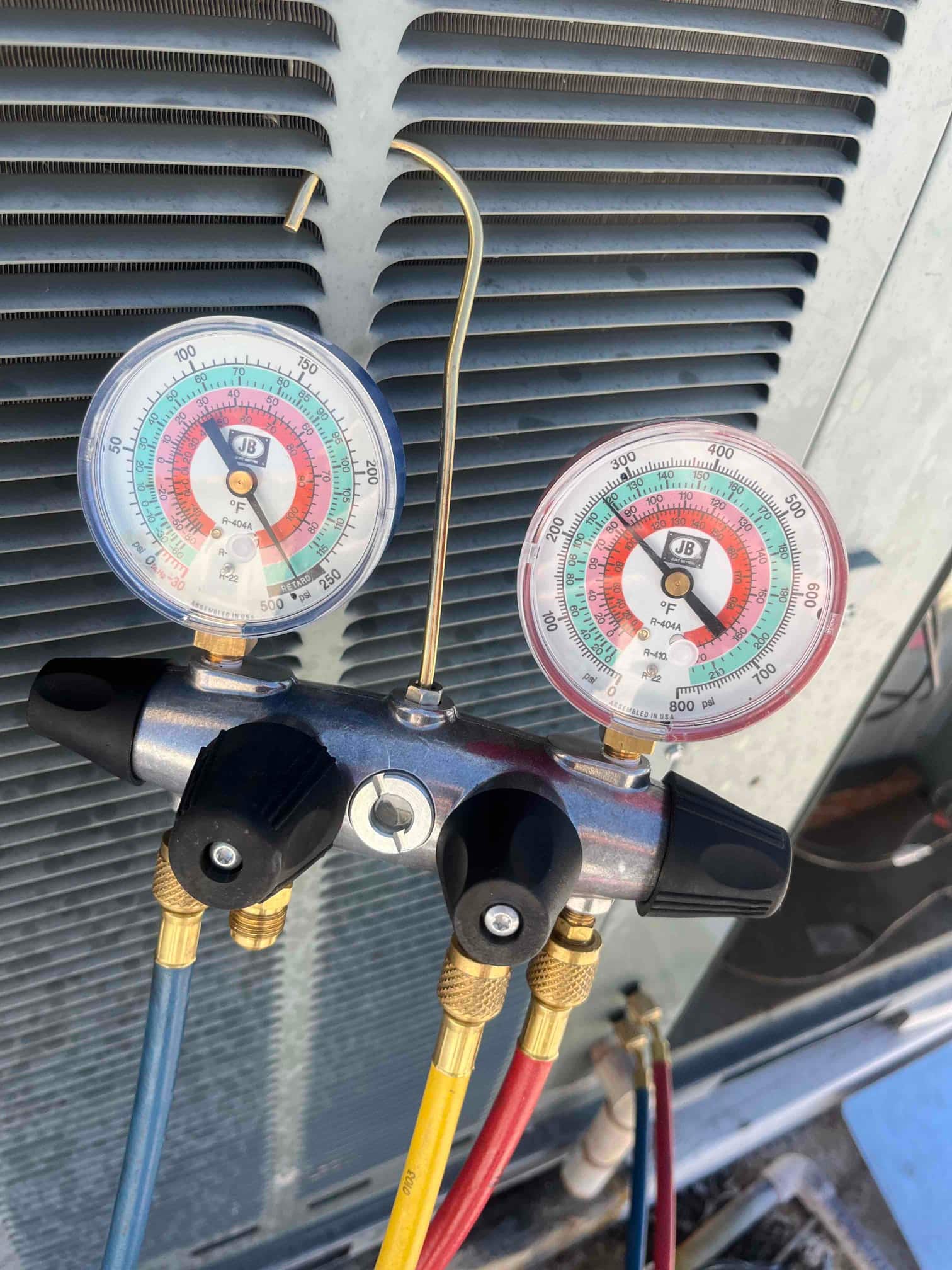 HVAC diagnostic instrument photographed during the service visit.
