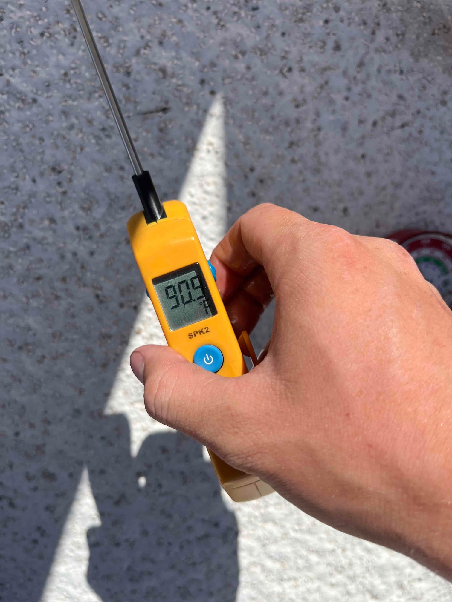 HVAC diagnostic instrument photographed during the service visit.