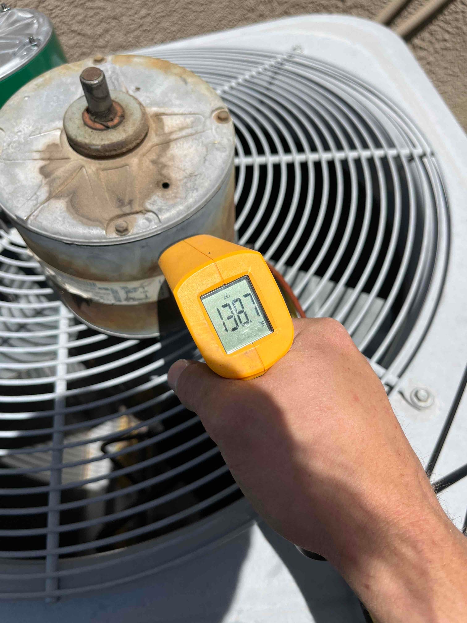 HVAC diagnostic instrument photographed during the service visit.