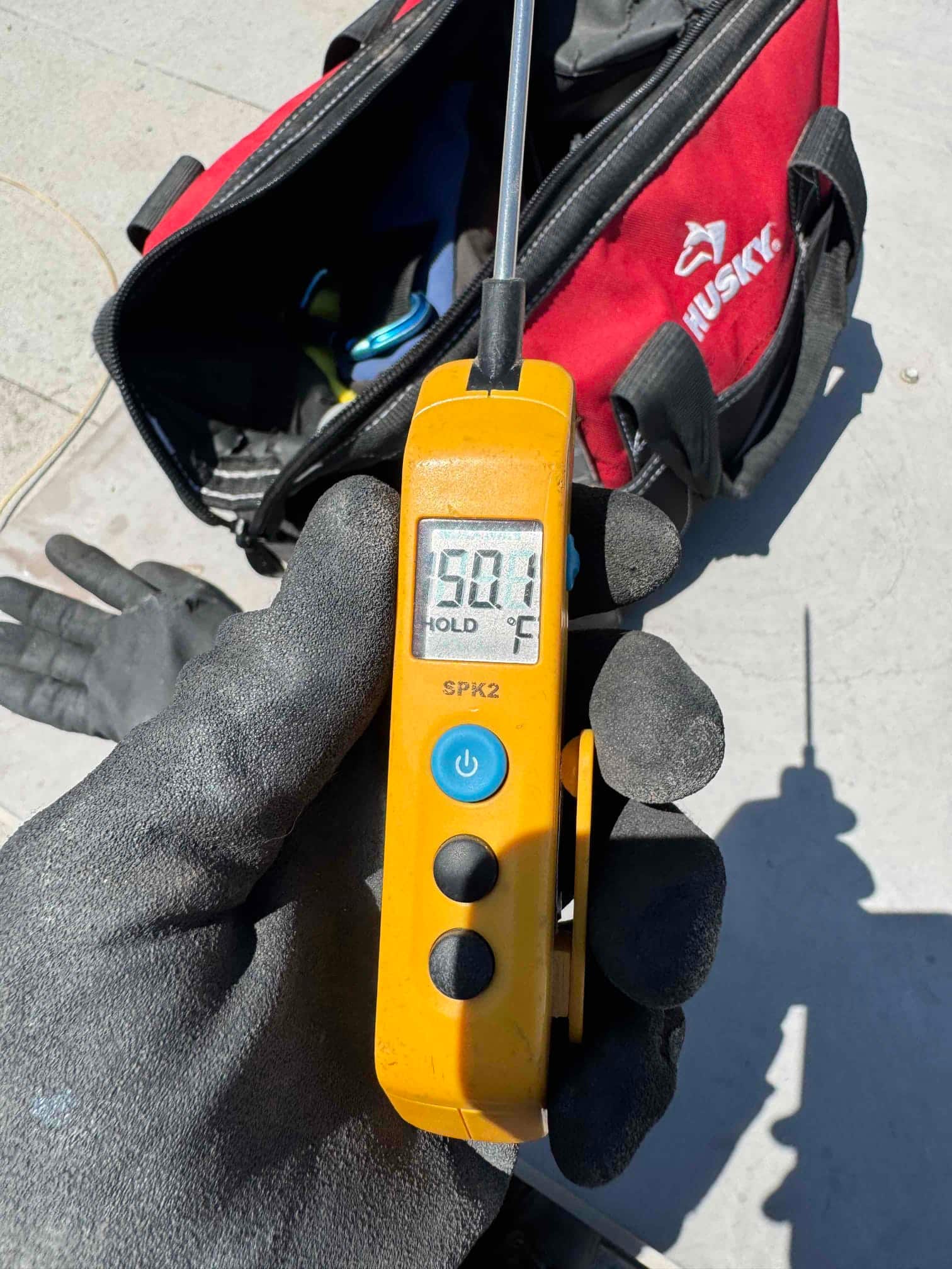 HVAC diagnostic instrument photographed during the service visit.