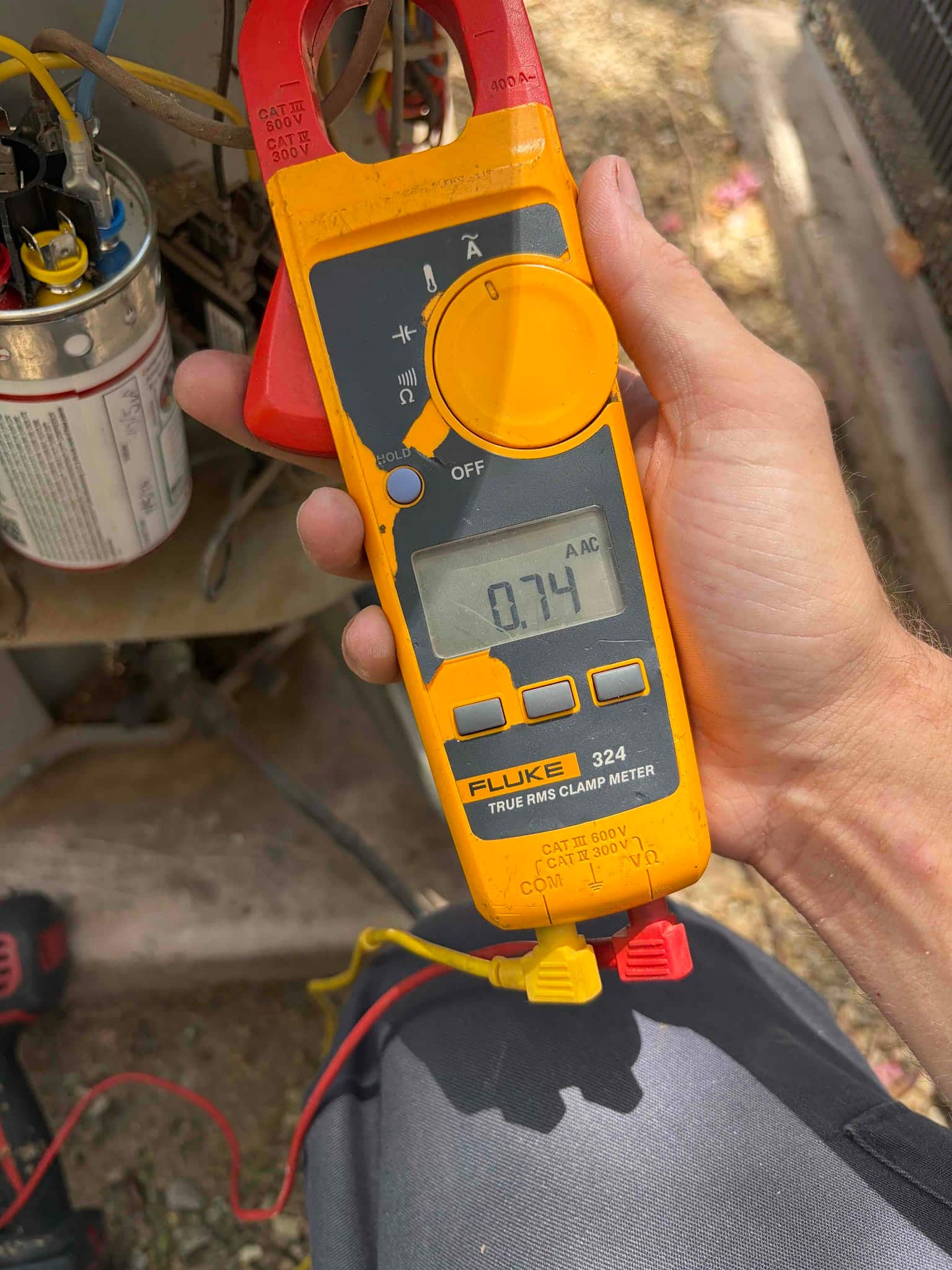HVAC diagnostic instrument photographed during the service visit.