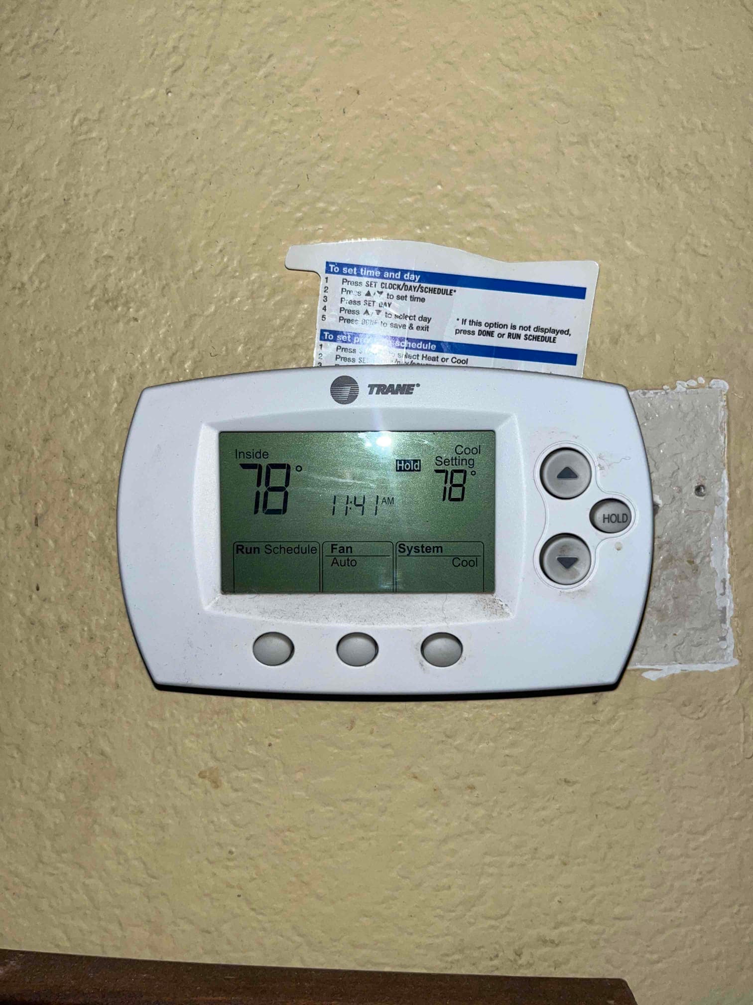 Wall-mounted thermostat displays inside 78 and cool setpoint 78, with fan on Auto and system set to Cool.