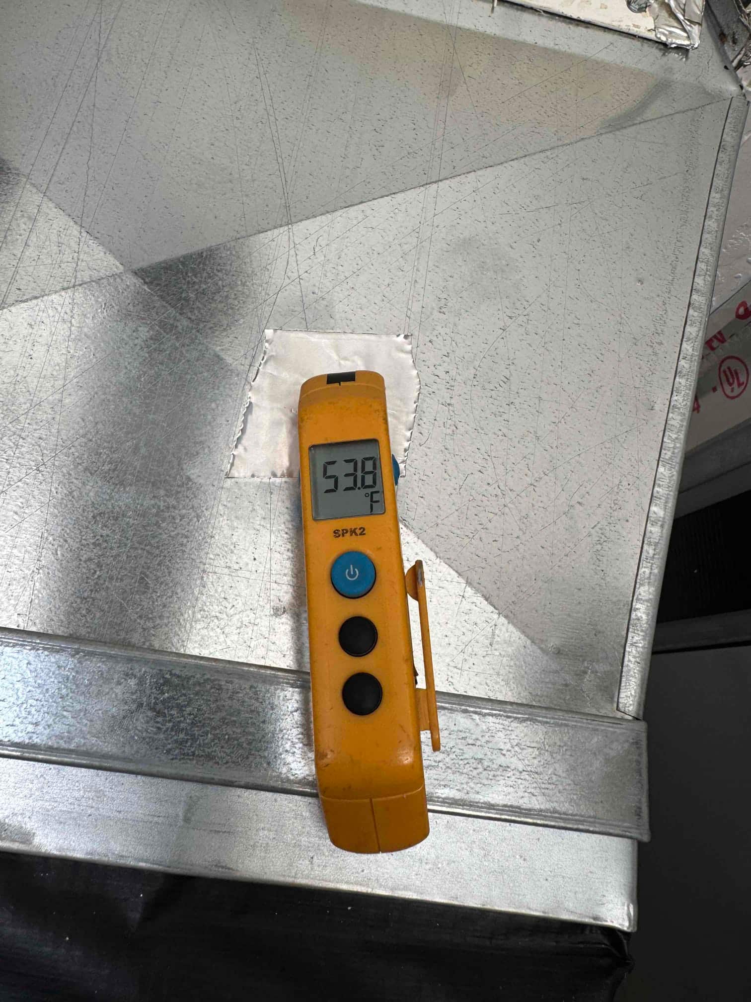 Diagnostic instrument display shows 53.8 °F.