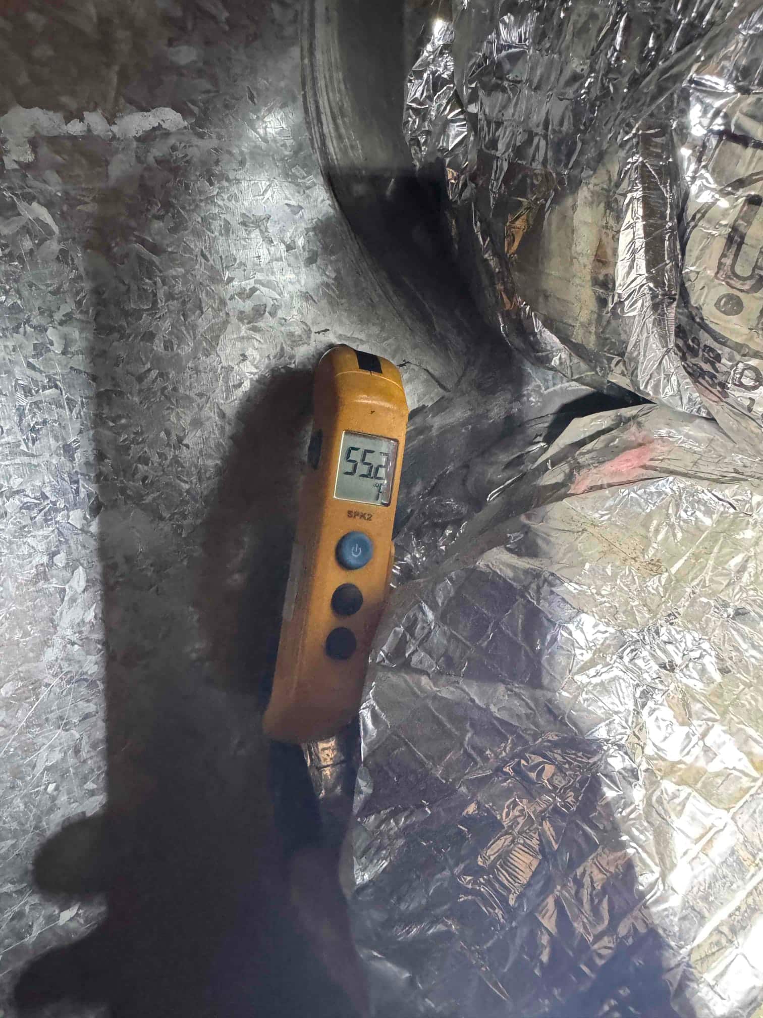 Diagnostic instrument display shows 55.5 °F.
