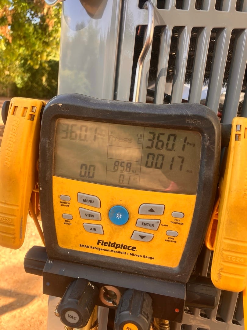 Digital manifold shows equal pressures of 360 PSI on both sides during the nitrogen pressure test of the new system.