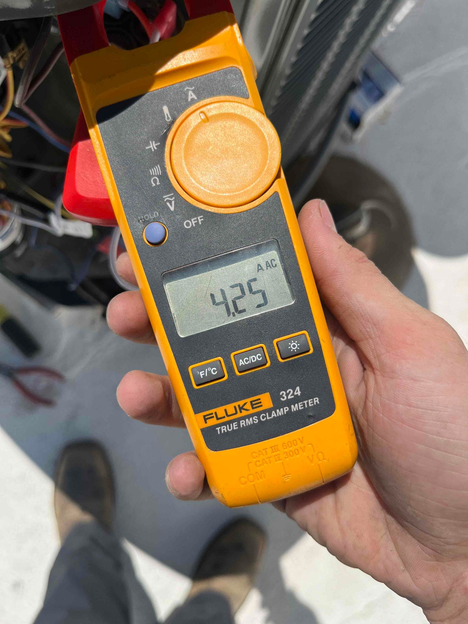 HVAC diagnostic instrument photographed during the service visit.
