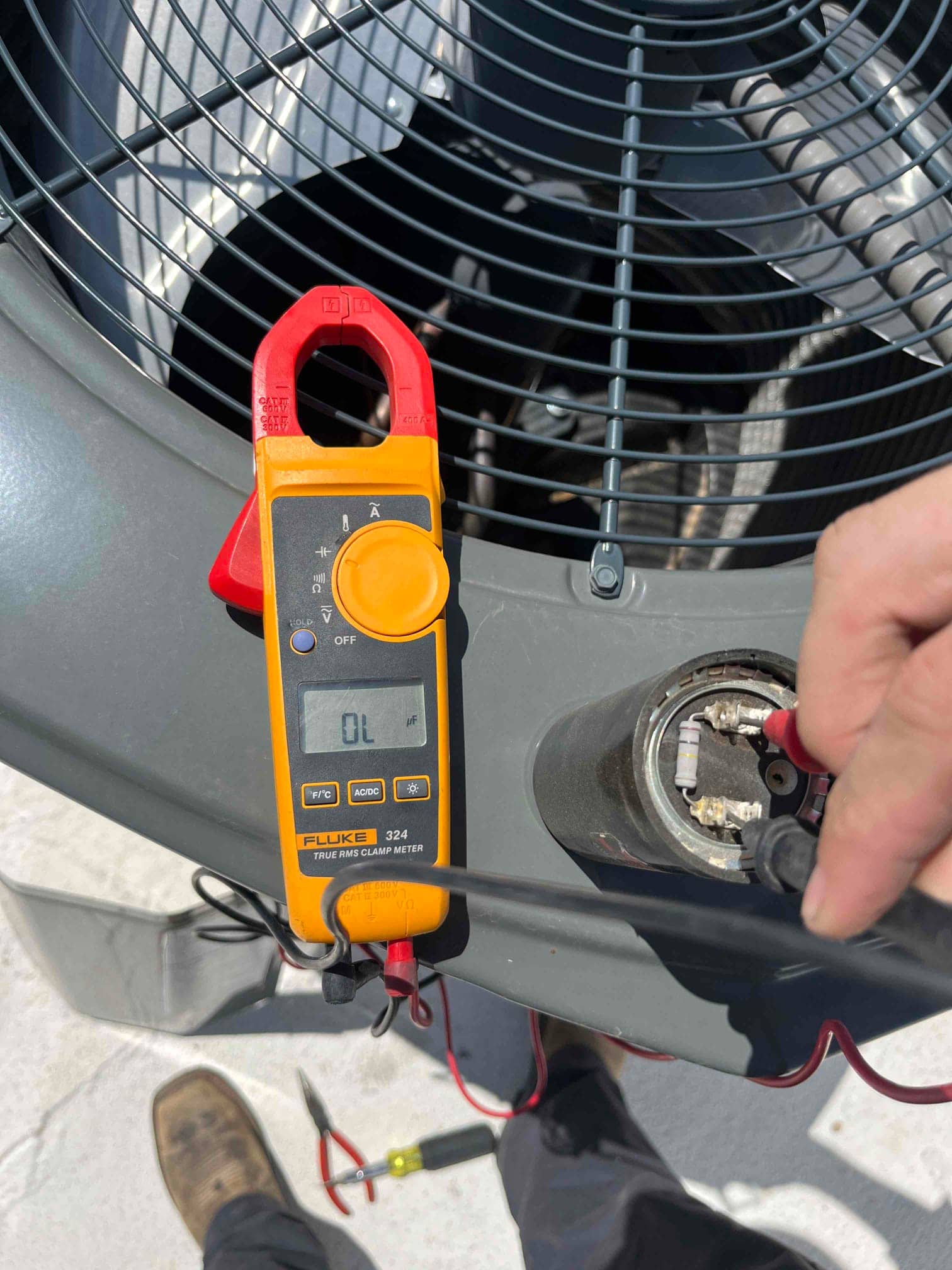 HVAC diagnostic instrument photographed during the service visit.