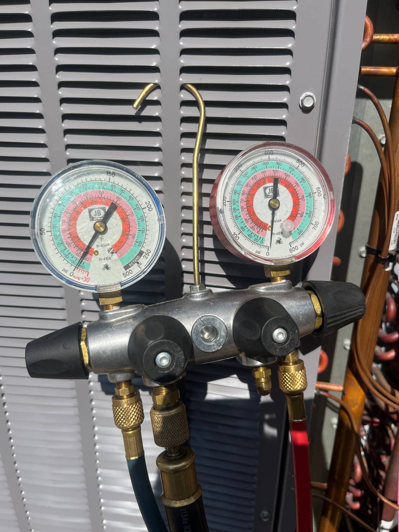 HVAC diagnostic instrument photographed during the service visit.