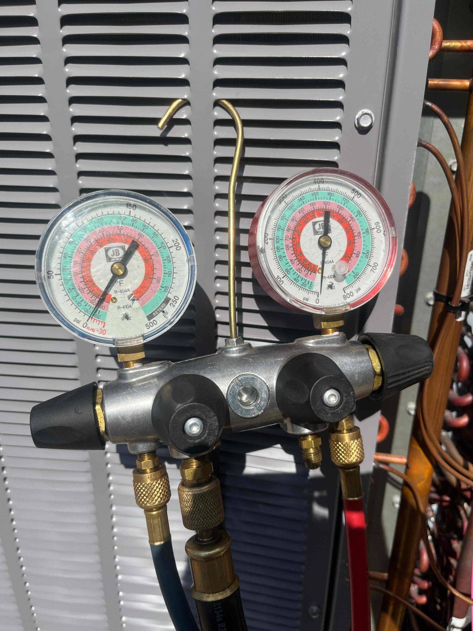 HVAC diagnostic instrument photographed during the service visit.