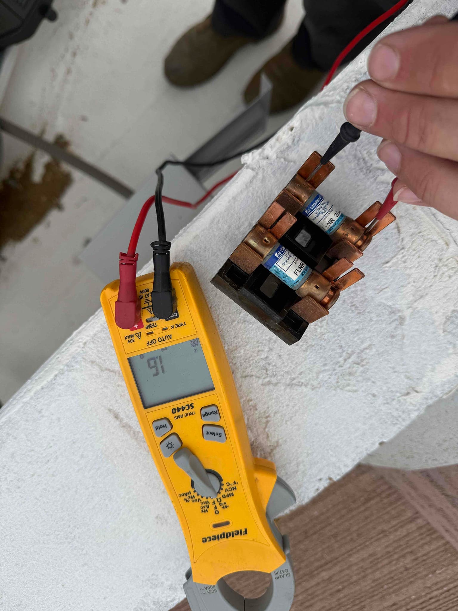 HVAC diagnostic instrument photographed during the service visit.