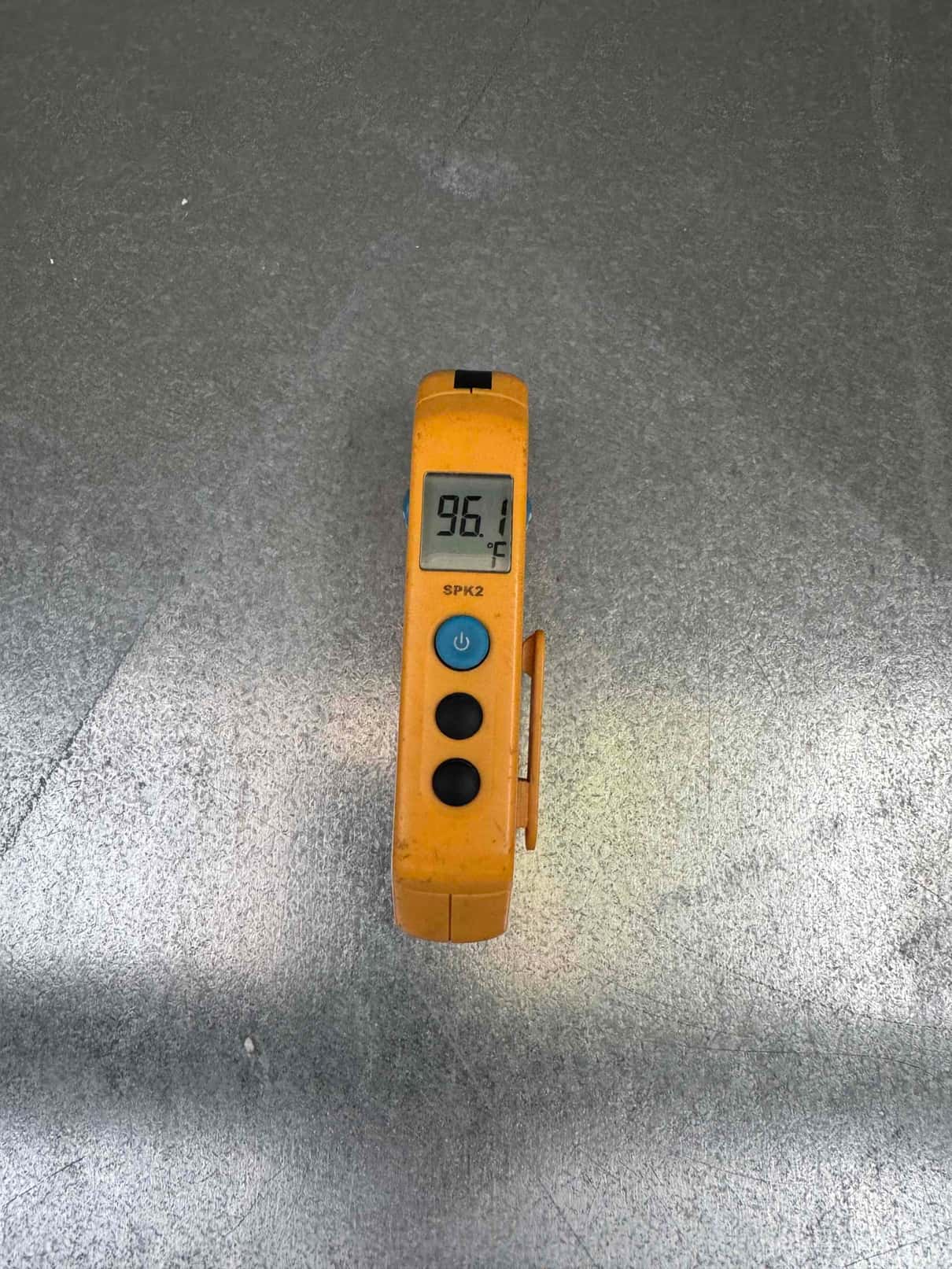 HVAC diagnostic instrument photographed during the service visit.