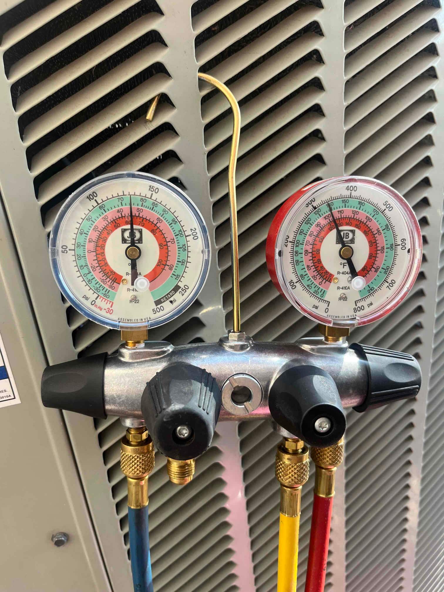 HVAC diagnostic instrument photographed during the service visit.