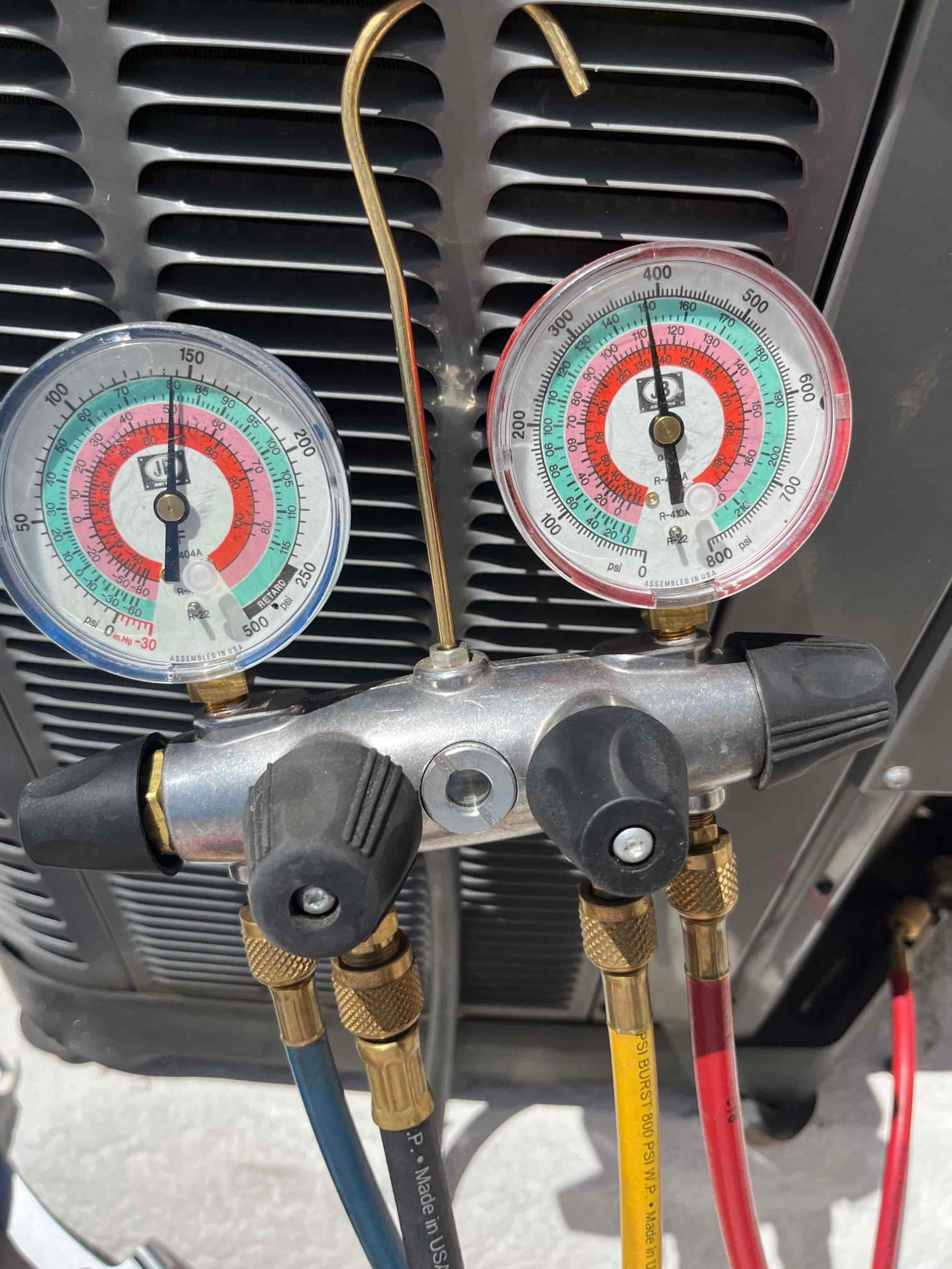 HVAC diagnostic instrument photographed during the service visit.