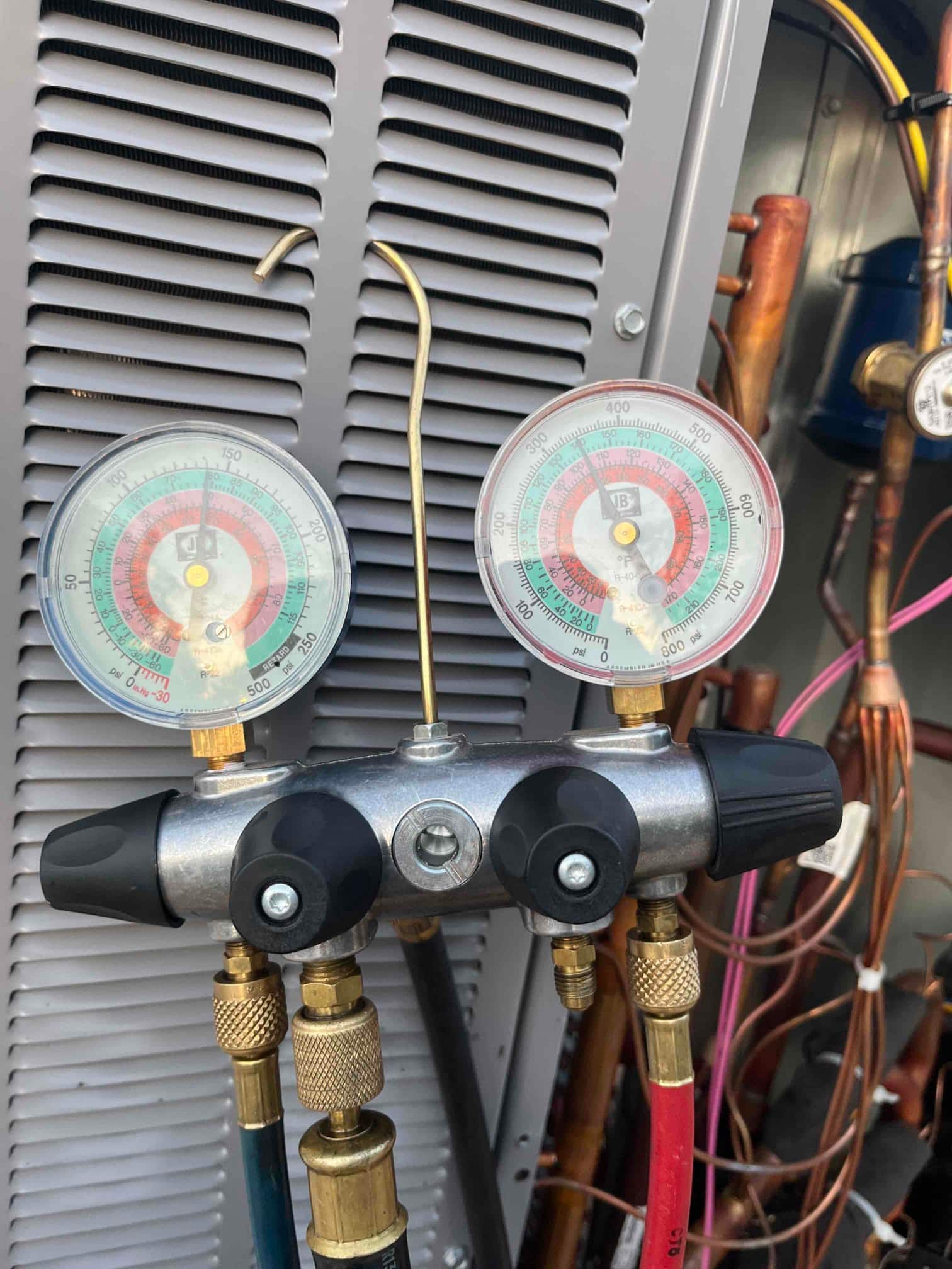 HVAC diagnostic instrument photographed during the service visit.