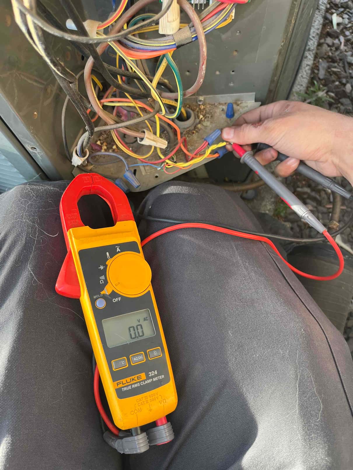 HVAC diagnostic instrument photographed during the service visit.
