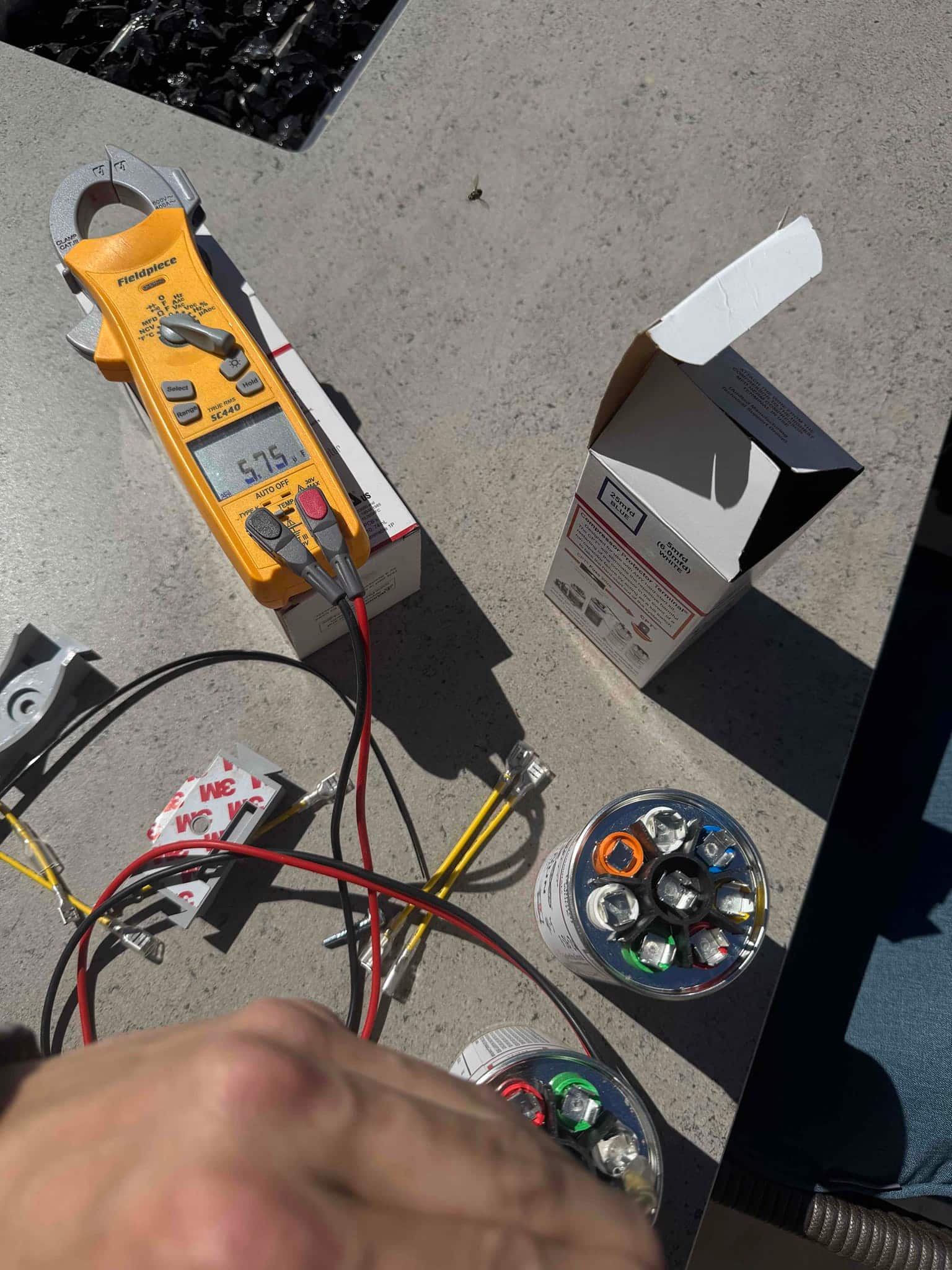 HVAC diagnostic instrument photographed during the service visit.
