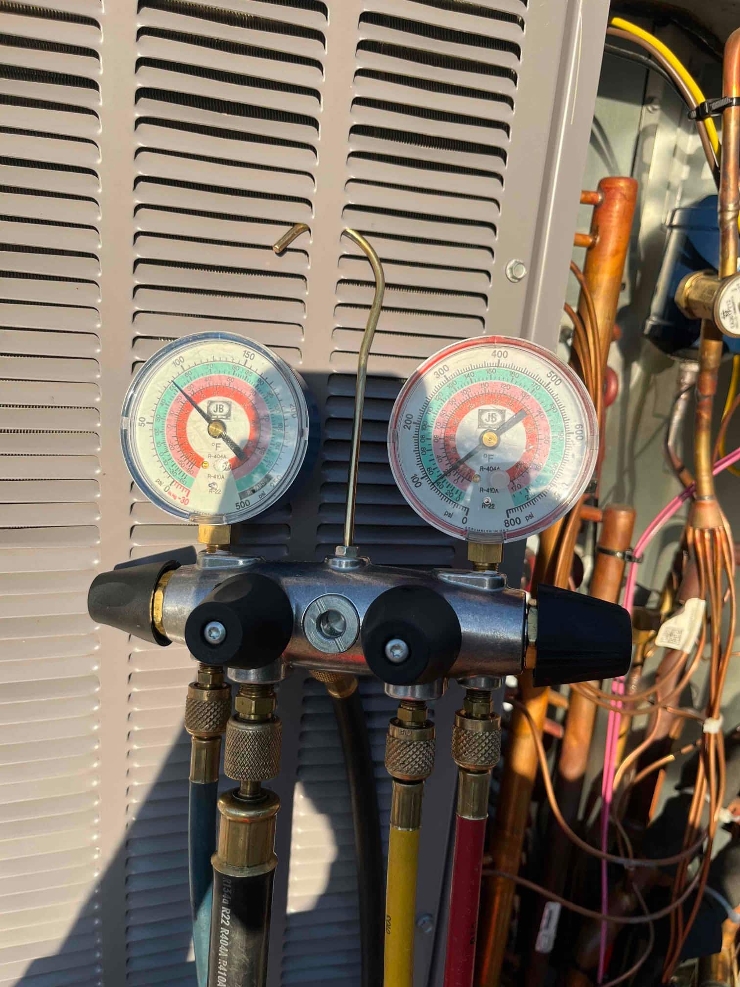 HVAC diagnostic instrument photographed during the service visit.