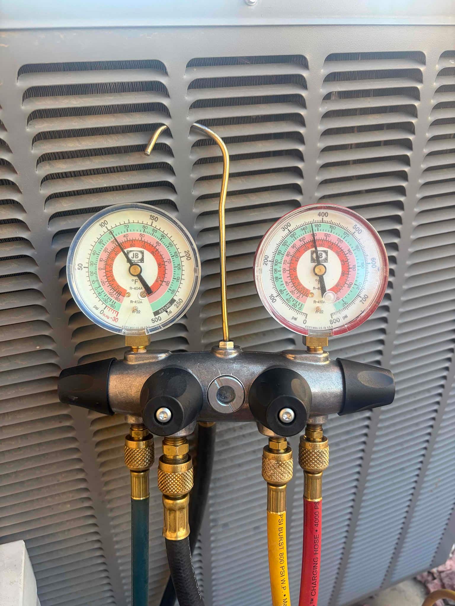 HVAC diagnostic instrument photographed during the service visit.