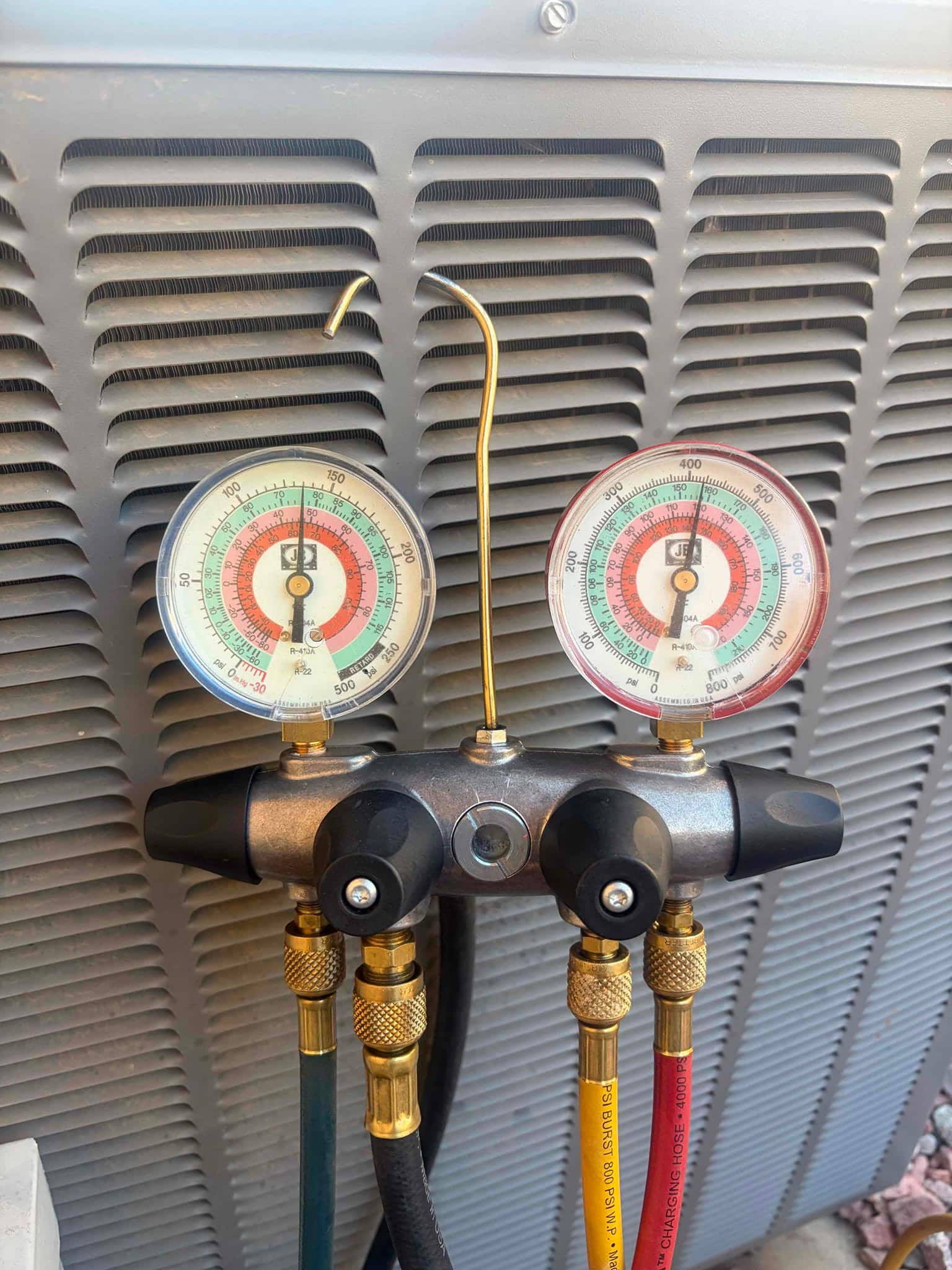 HVAC diagnostic instrument photographed during the service visit.