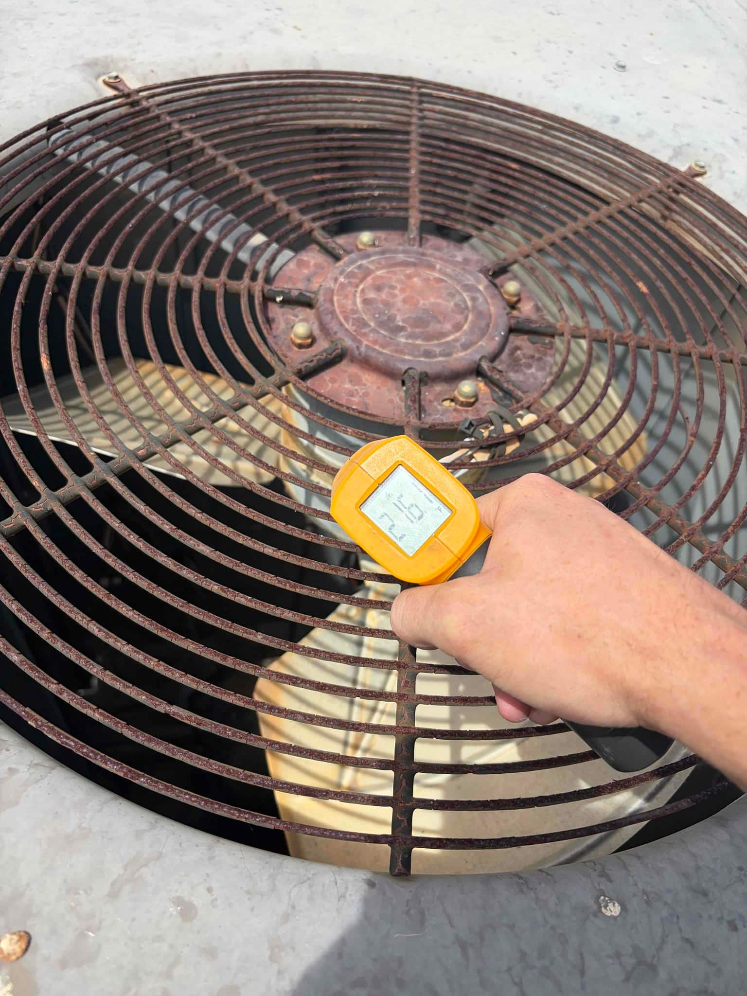 HVAC diagnostic instrument photographed during the service visit.