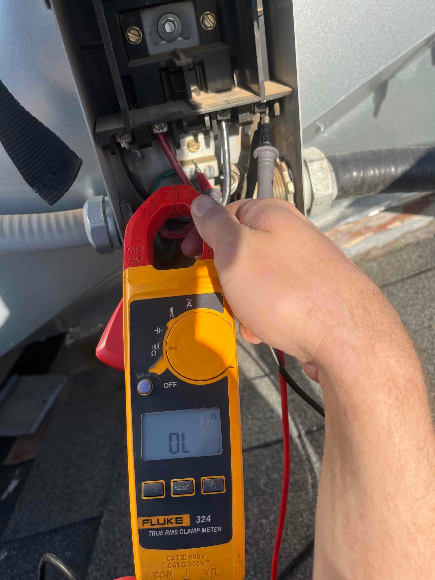 HVAC diagnostic instrument photographed during the service visit.
