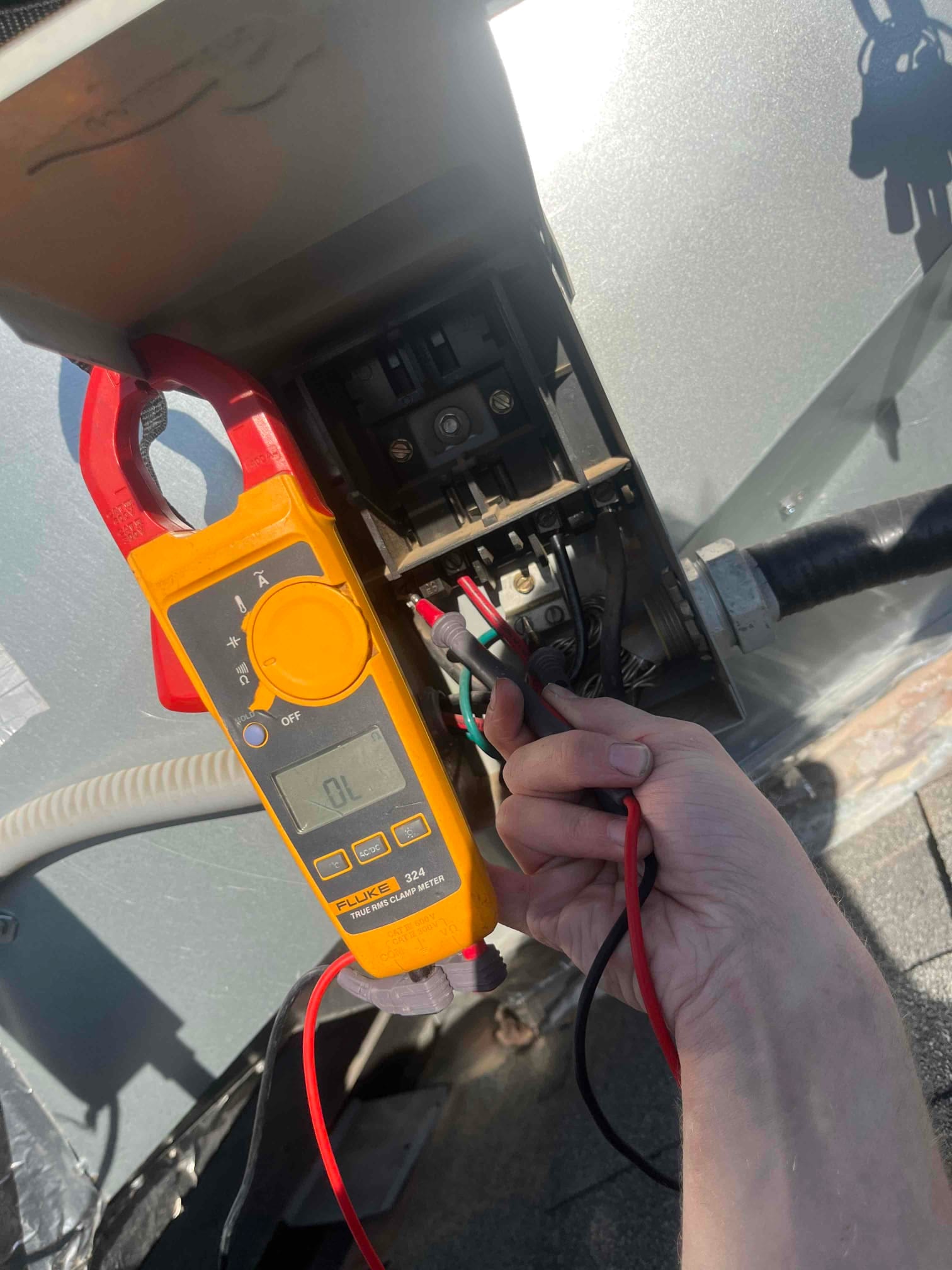 HVAC diagnostic instrument photographed during the service visit.