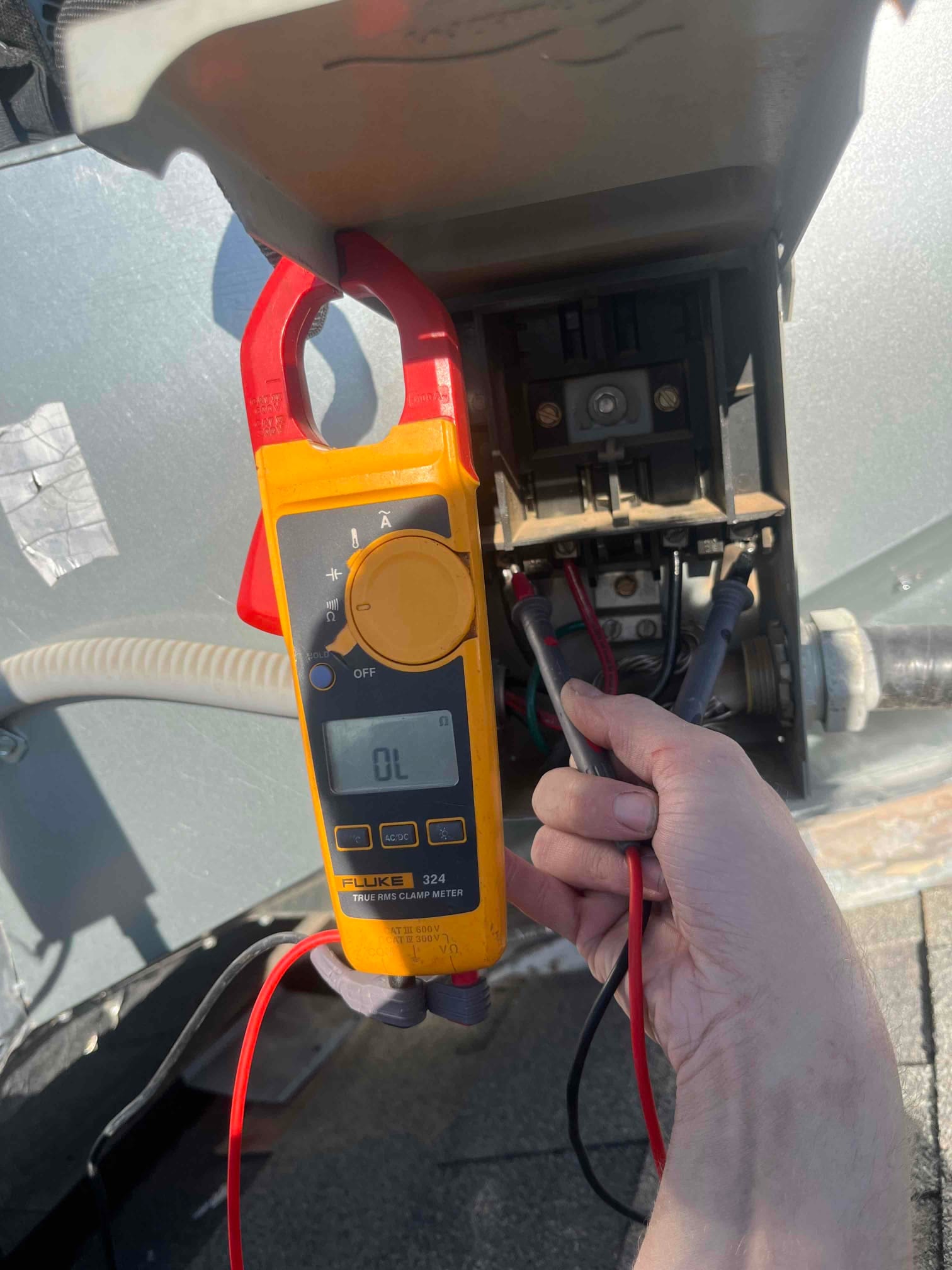 HVAC diagnostic instrument photographed during the service visit.