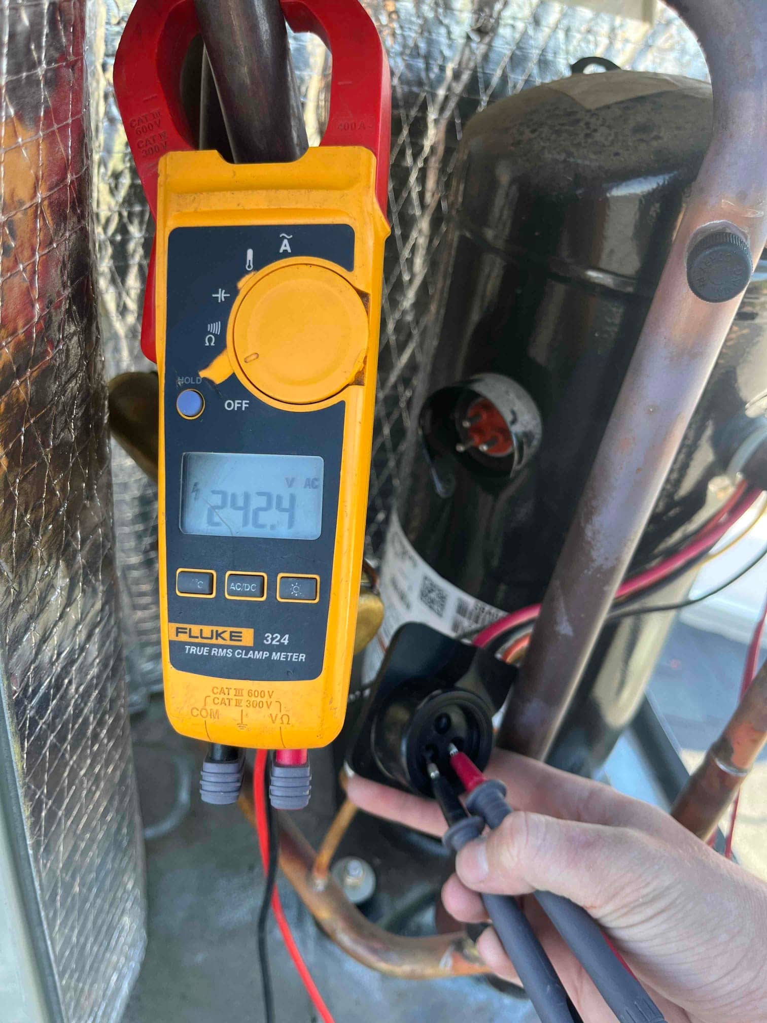 HVAC diagnostic instrument photographed during the service visit.