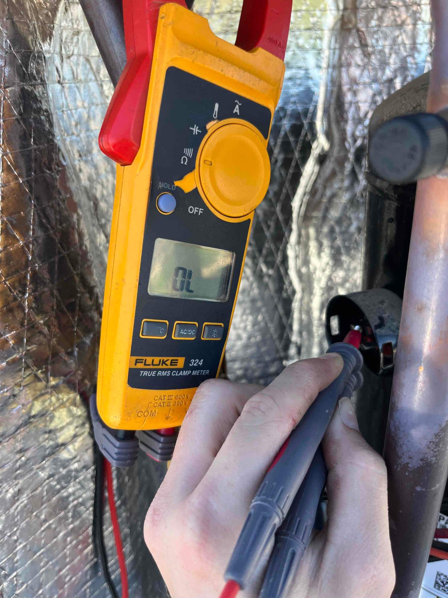 HVAC diagnostic instrument photographed during the service visit.