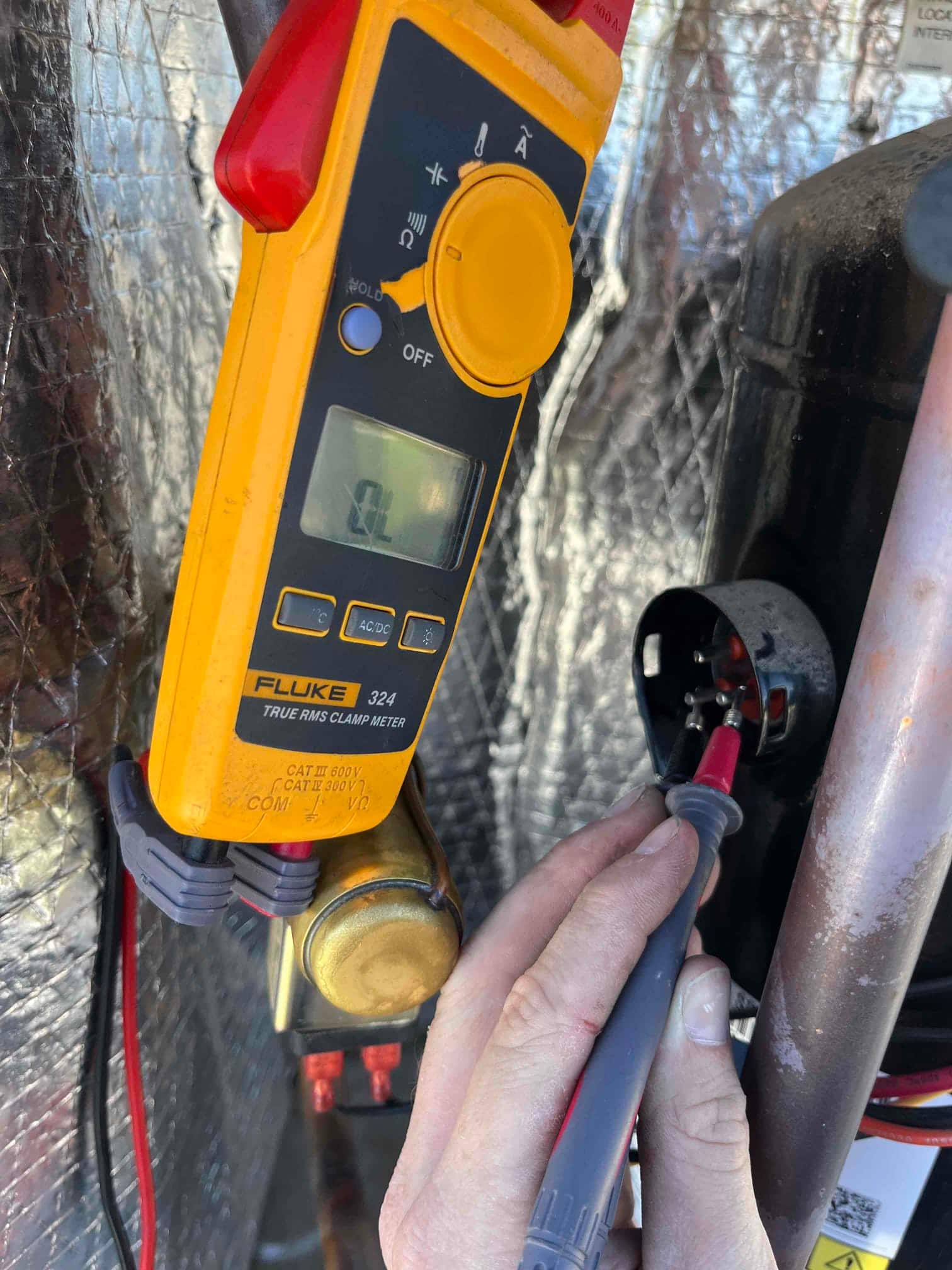 HVAC diagnostic instrument photographed during the service visit.