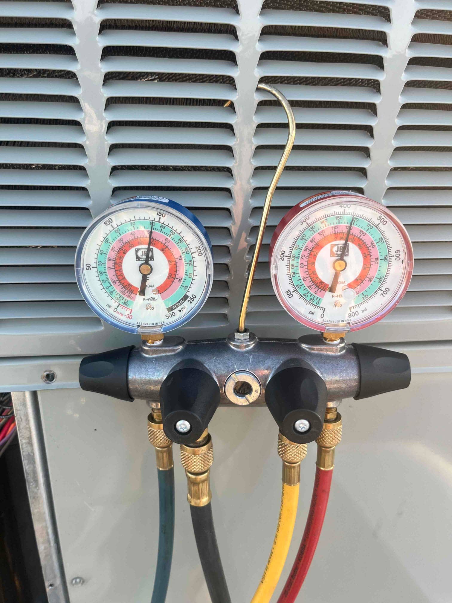 HVAC diagnostic instrument photographed during the service visit.