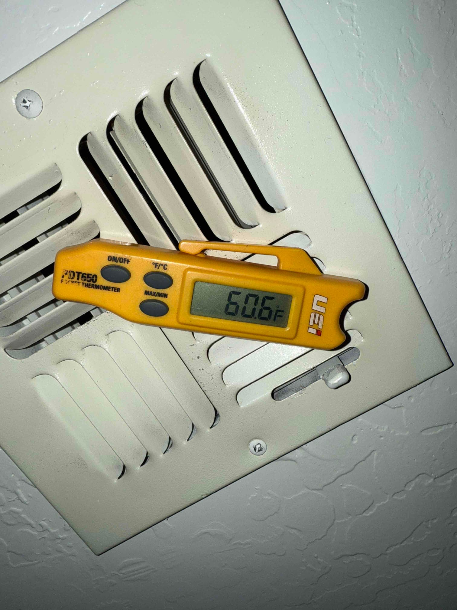 Diagnostic instrument display shows 60.6 °F.