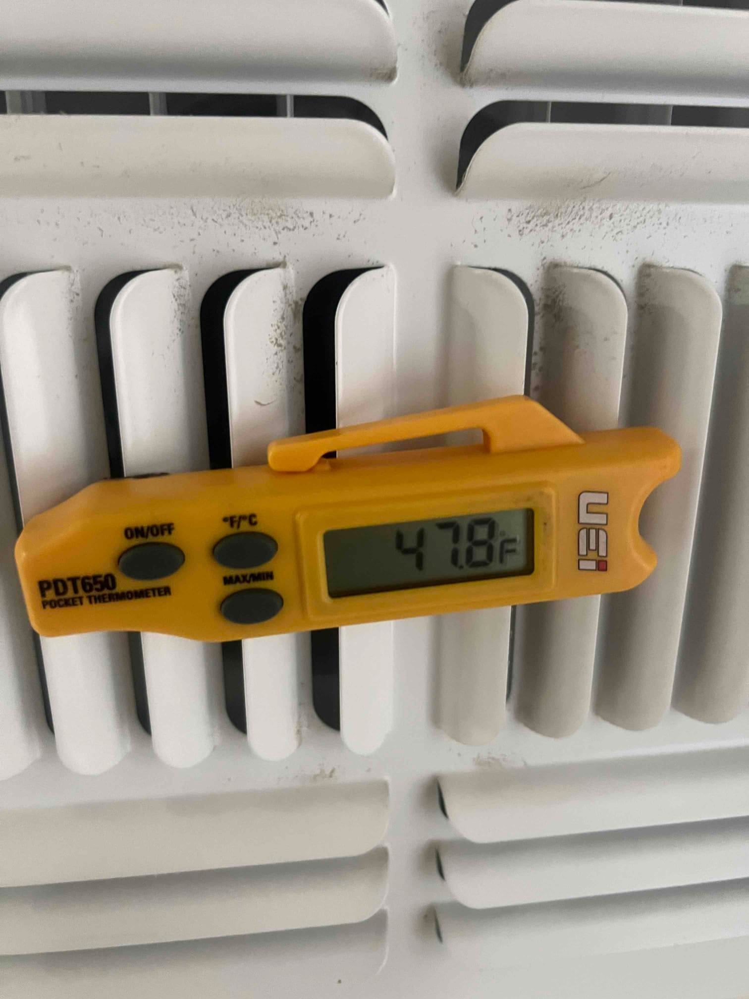 HVAC diagnostic instrument photographed during the service visit.